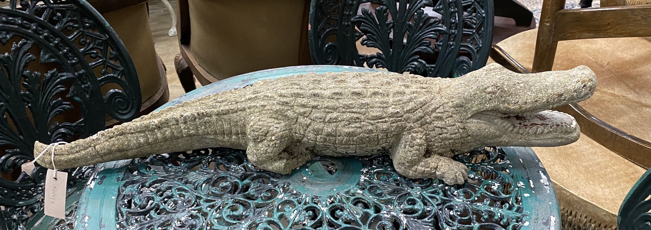 A reconstituted stone alligator garden ornament, length 82cm                                                                                                                                                                