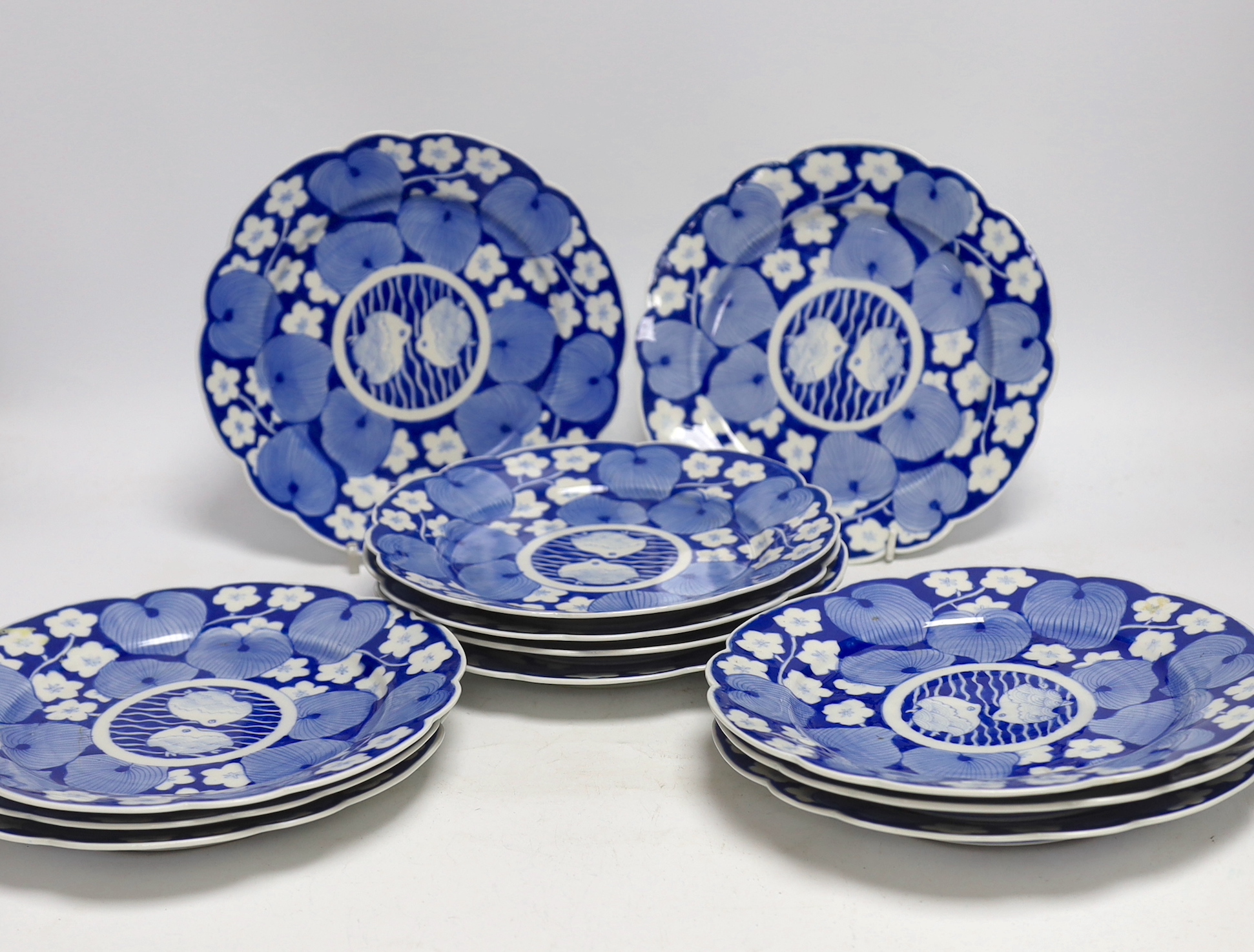 Twelve Japanese blue and white ‘fish’ plates, 21cm diameter                                                                                                                                                                 