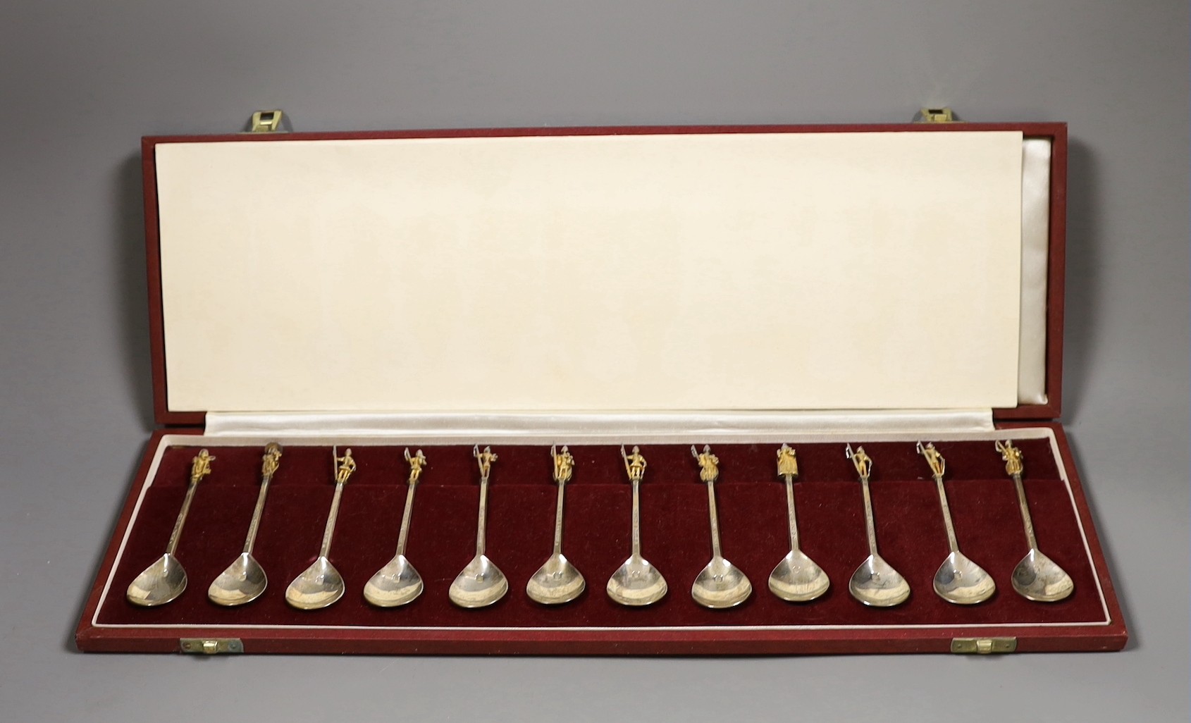 A set of twelve parcel gilt silver commemorative Tichborne spoons, in presentation case, 9oz                                                                                                                                
