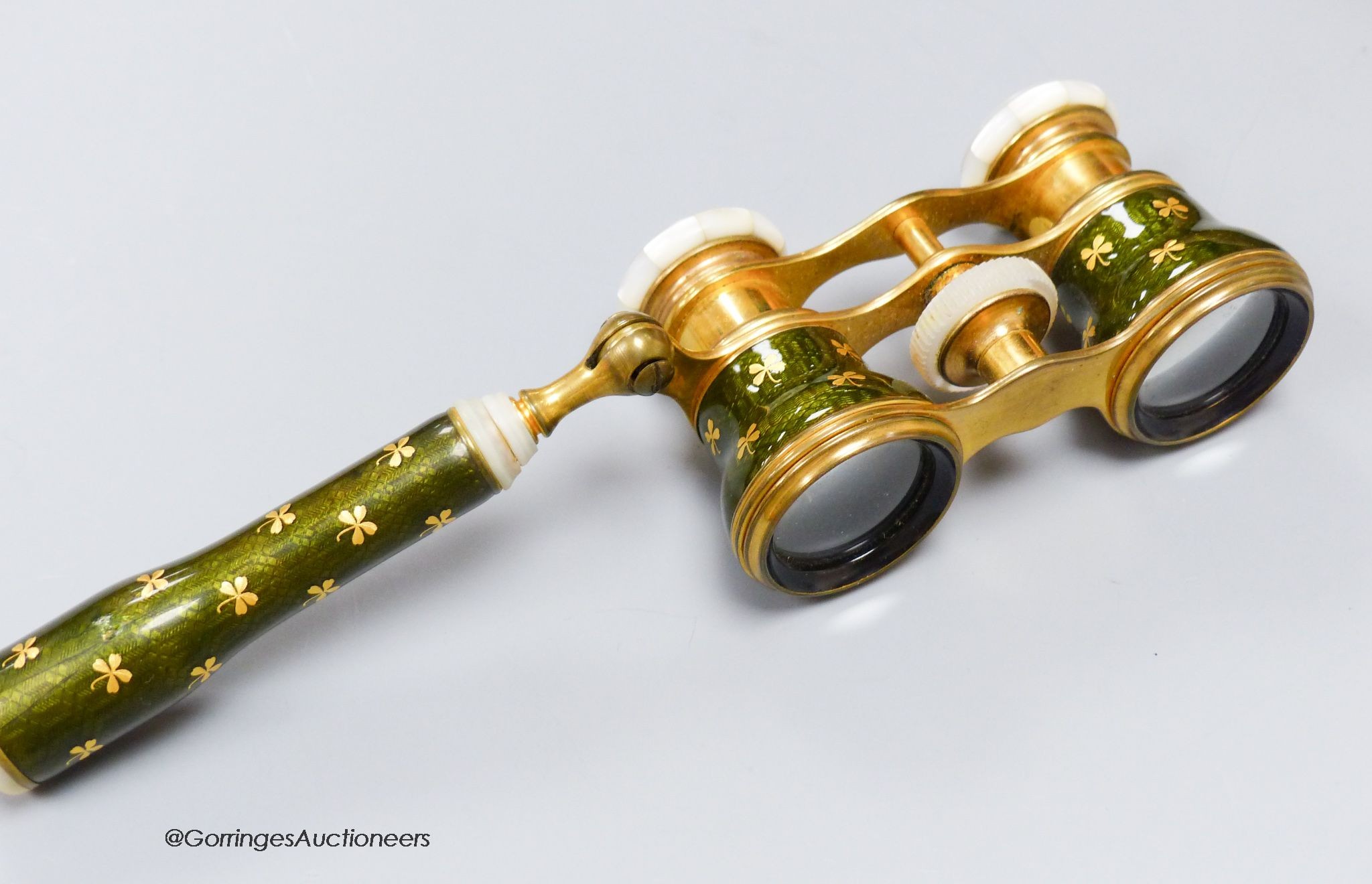 A pair of gilt brass, enamel and mother-of-pearl opera glasses, c.1900                                                                                                                                                      