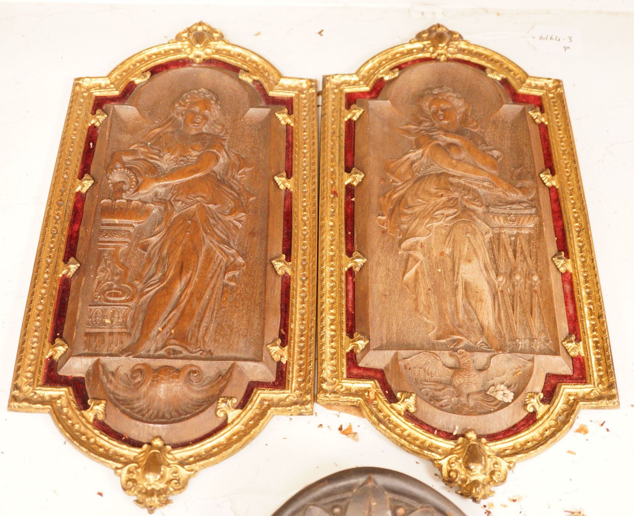 A pair of 19th century French ormolu mounted bois durci plaques, 50cm                                                                                                                                                       