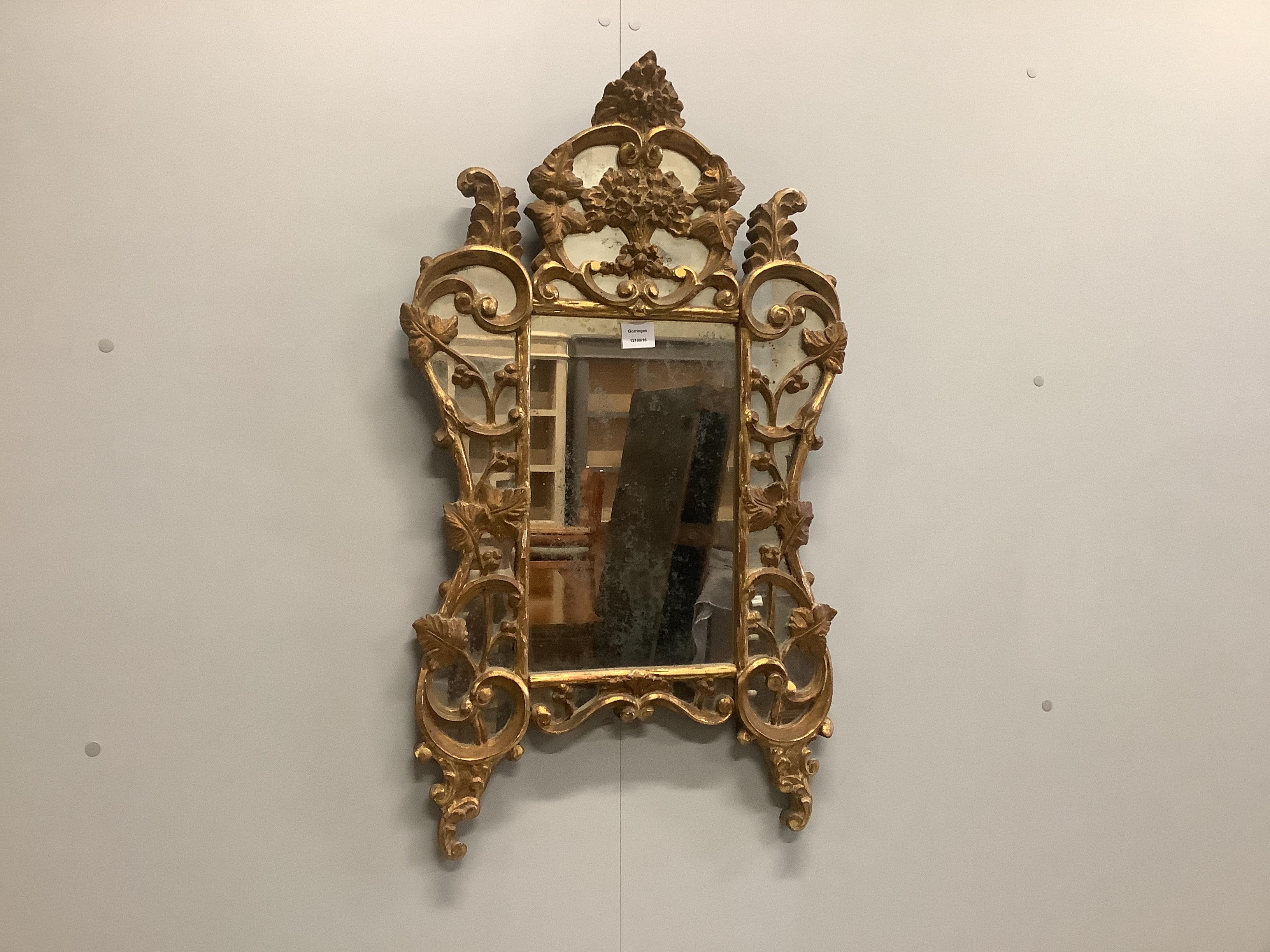 A small 18th century style gilt composition marginal plate wall mirror, width 55cm, height 94cm                                                                                                                             