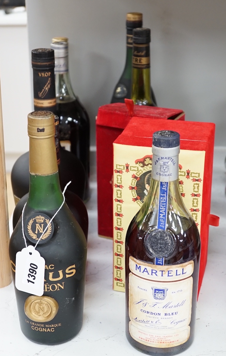 Four 1 litre bottles of cognac including Martell Cordon Bleu, Courvoisier, Martell and Remy Martin together with six smaller bottles of cognac including Martell Cordon Bleu, Camus Napoleon, Courvoisier, Napoleon, Gran Du