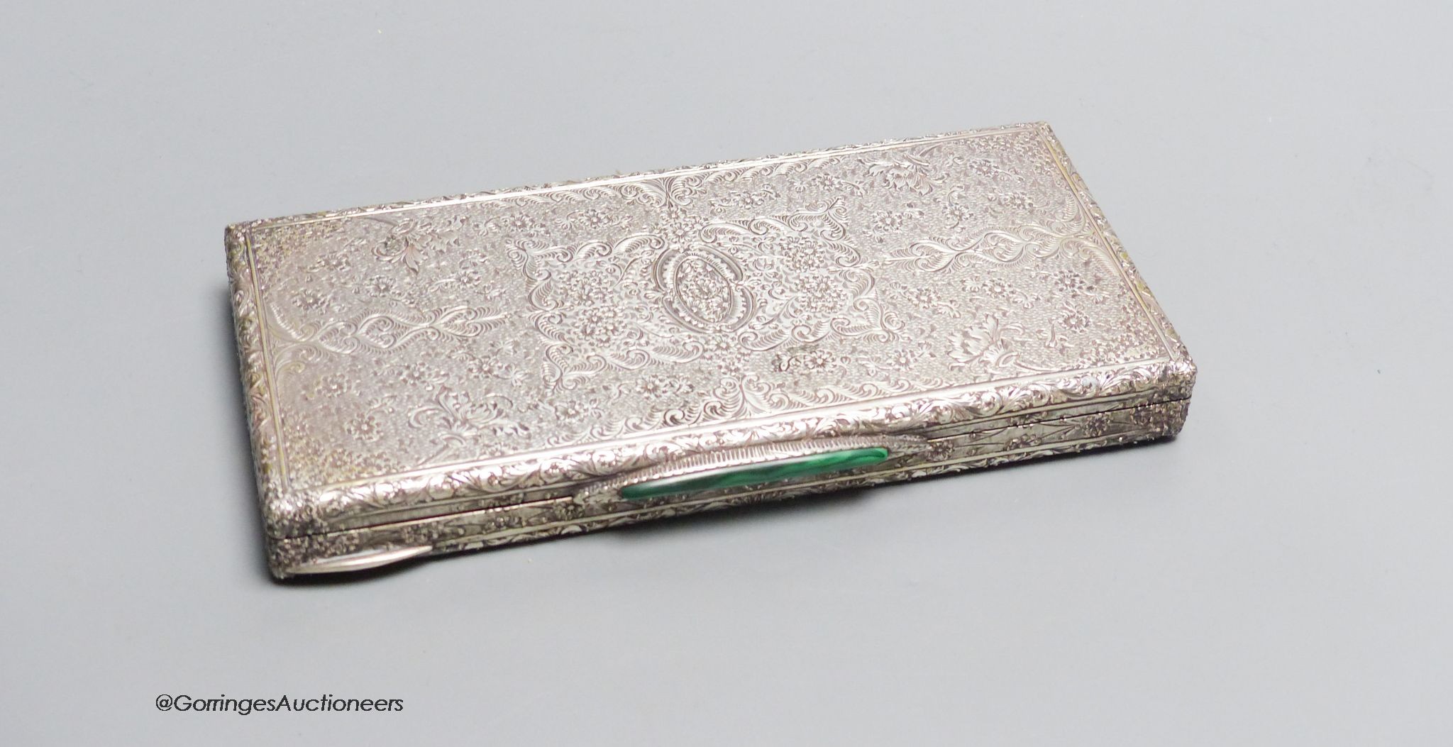 An Italian 800 standard foliate engraved cigarette case, malachite thumb rest, Retailers label C. Pavese, Genova, 10.8oz., 18 cm                                                                                            