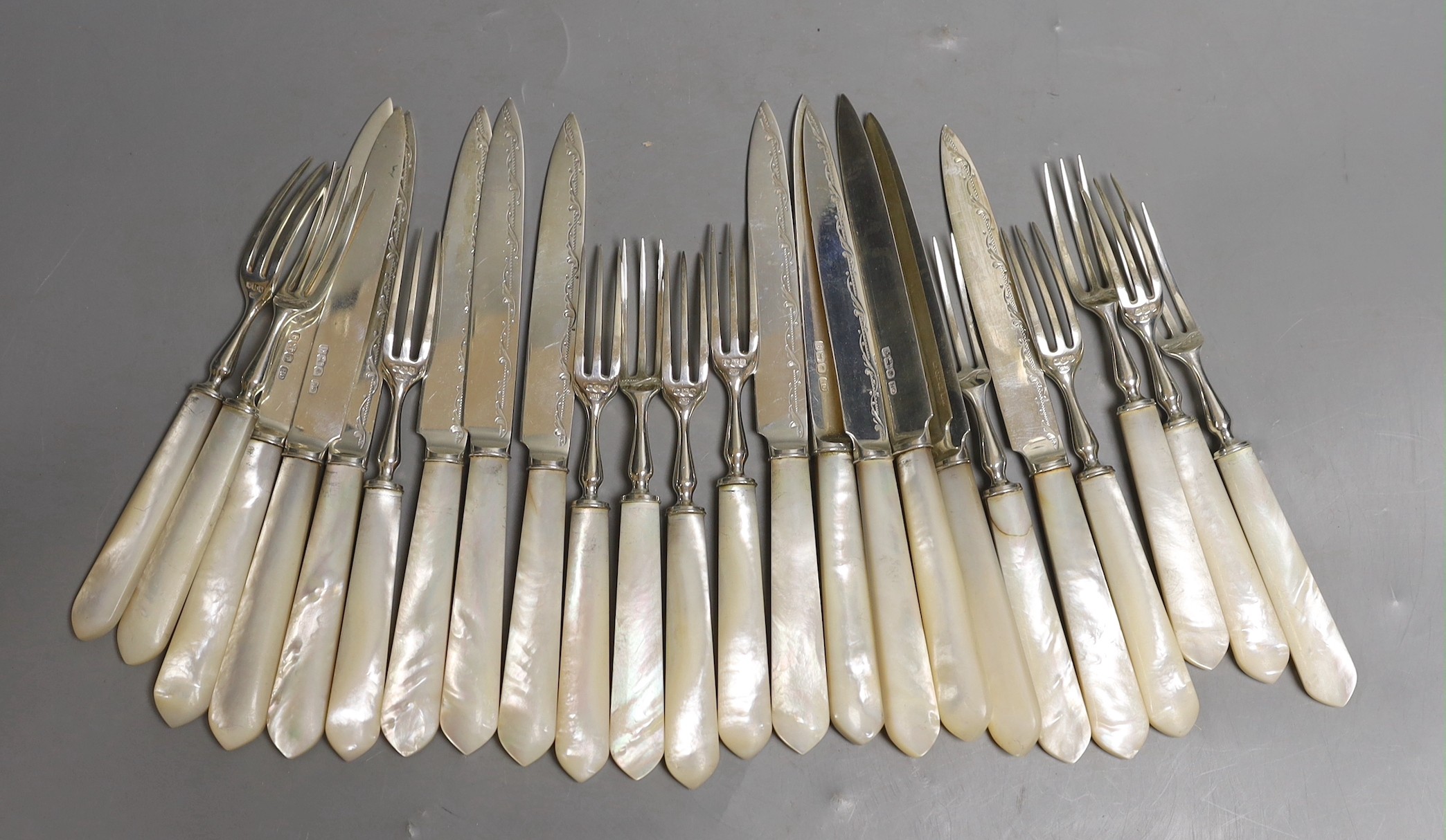 Twelve pairs of George V mother of pearl handled fruit eaters, George Howson, Sheffield, 1933.                                                                                                                              