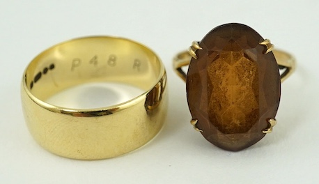 A 1970's 9ct gold wedding band and a 9ct gold and gem set rings, gross weight 9.2 grams. Condition - poor to fair                                                                                                           