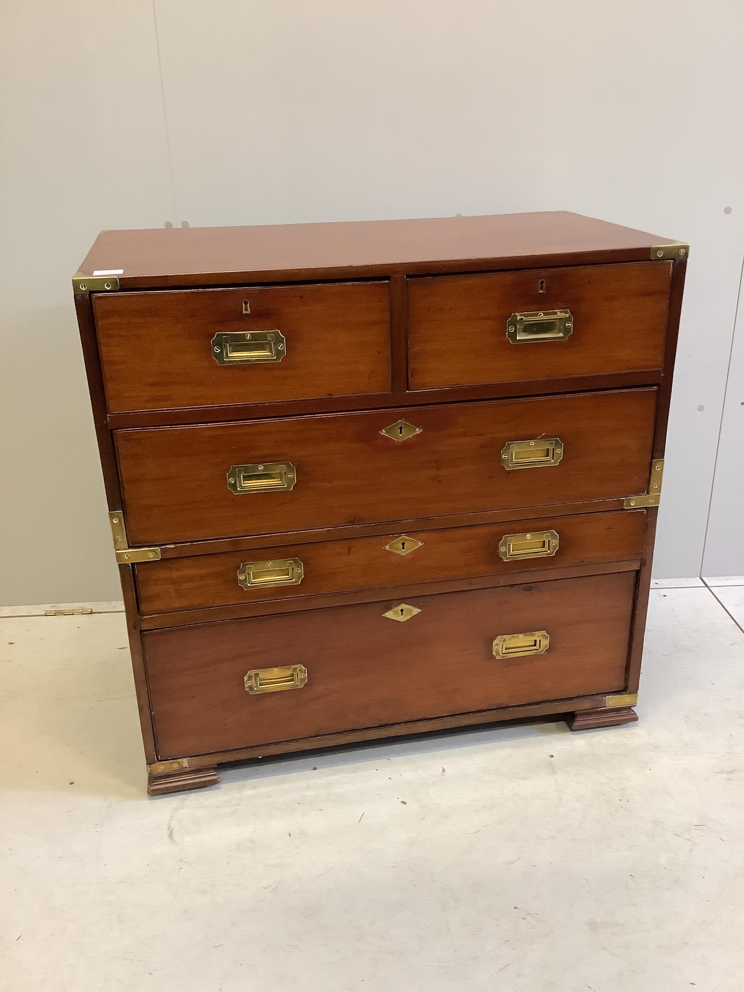 A 19th century military style mahogany two part chest, width 91cm, depth 50cm, height 90cm. Condition - fair to good                                                                                                        