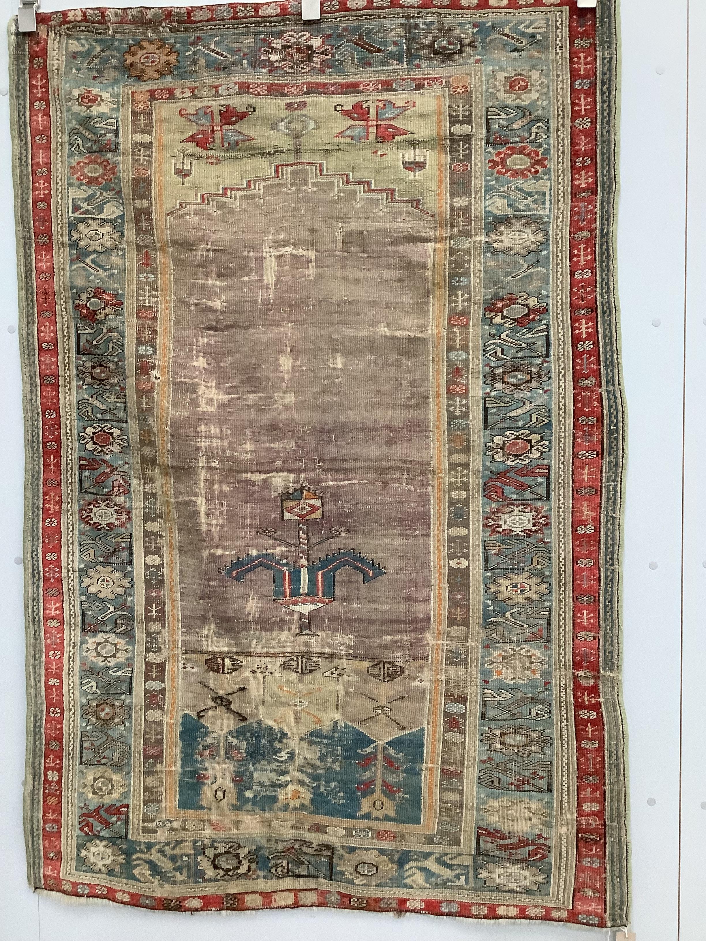 An antique Turkish prayer rug, 168 x 111cm                                                                                                                                                                                  