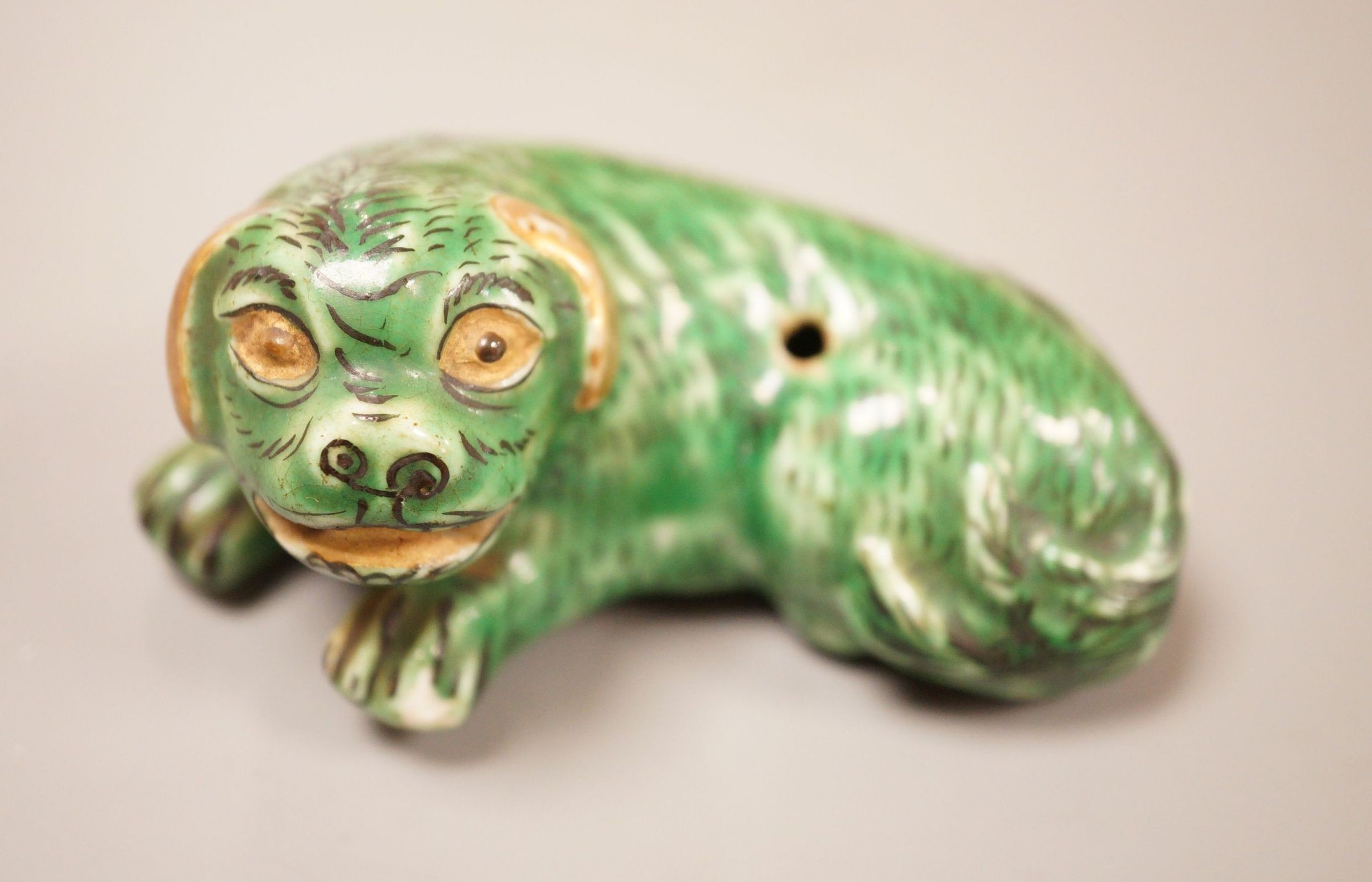 A small Chinese or Japanese green glazed dog waterdropper, 8.5cm wide                                                                                                                                                       