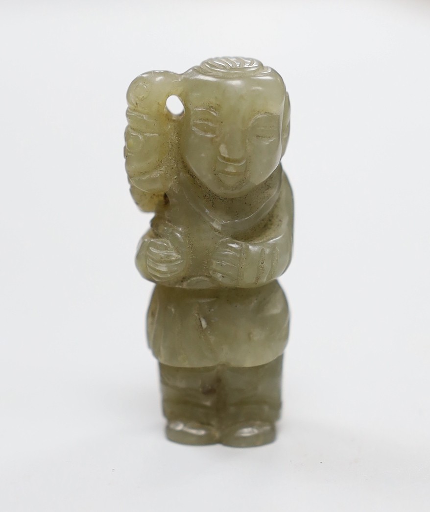 A Chinese celadon jade figure of a boy. 4.5cm tall                                                                                                                                                                          