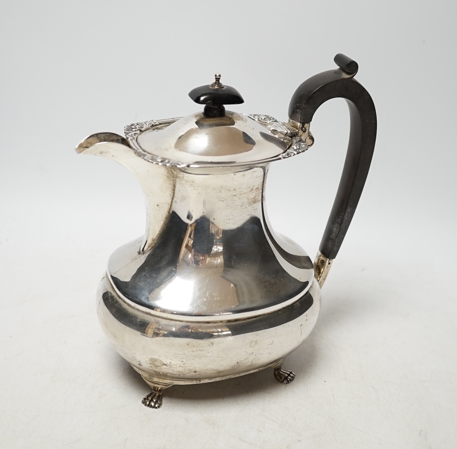 A George V silver hot water jug, Alexander Clark Co. Ltd, Birmingham, 1921, gross 18oz. Condition - fair to good                                                                                                            