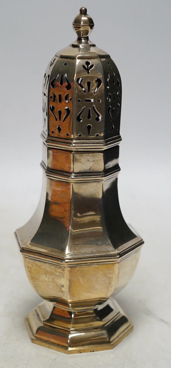 A George VI silver octagonal sugar caster, Goldsmiths & Silversmiths Co Ltd, London, 1937, 21cm, 8.7oz. Condition - fair to good                                                                                            