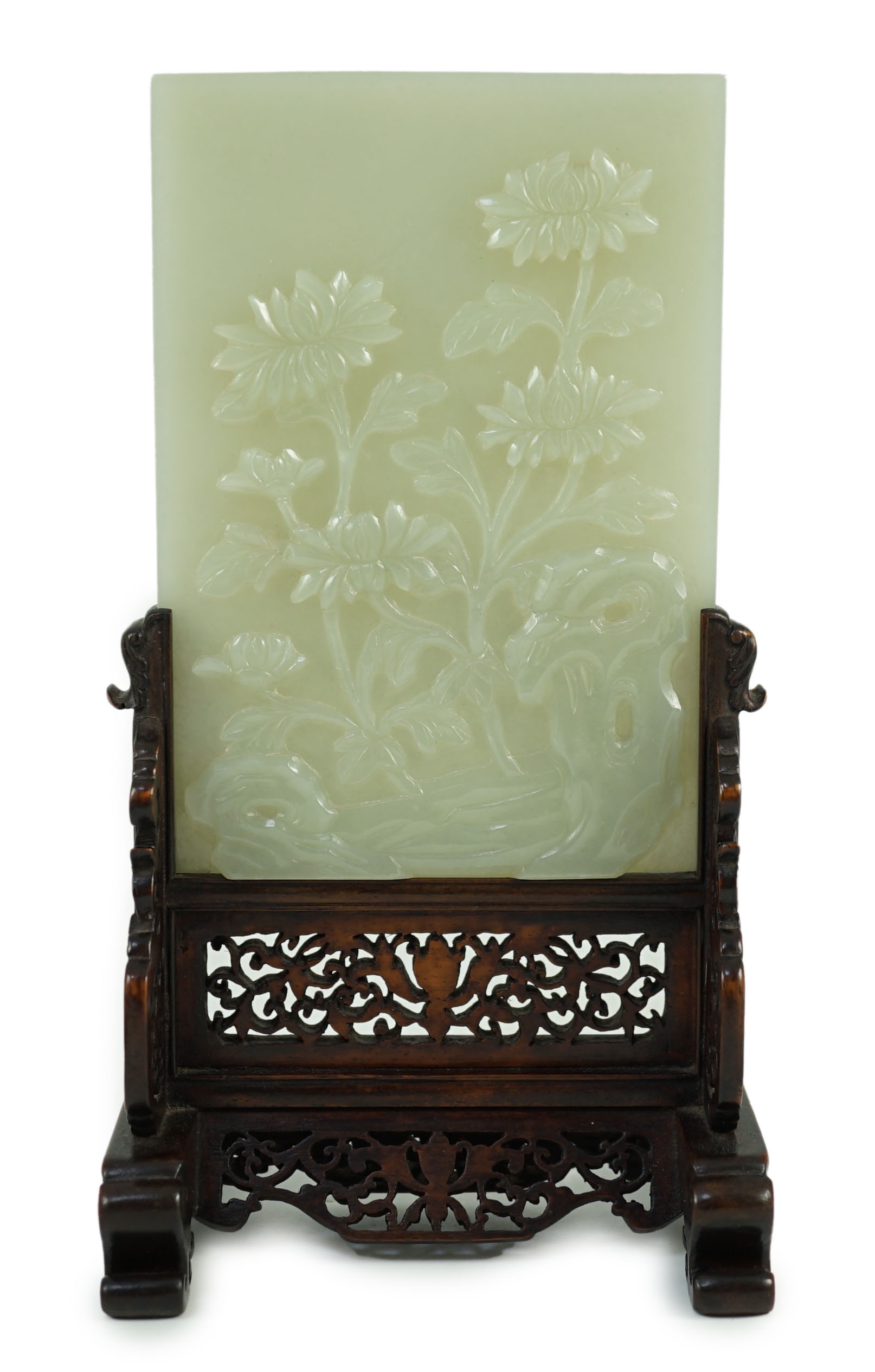 A good Chinese celadon jade ‘peonies and rockwork’ small table screen and stand, 18th/19th century, Jade 14.7 cm x 10.3cm, total size including carved wood stand 22cm x 12.3cm                                             