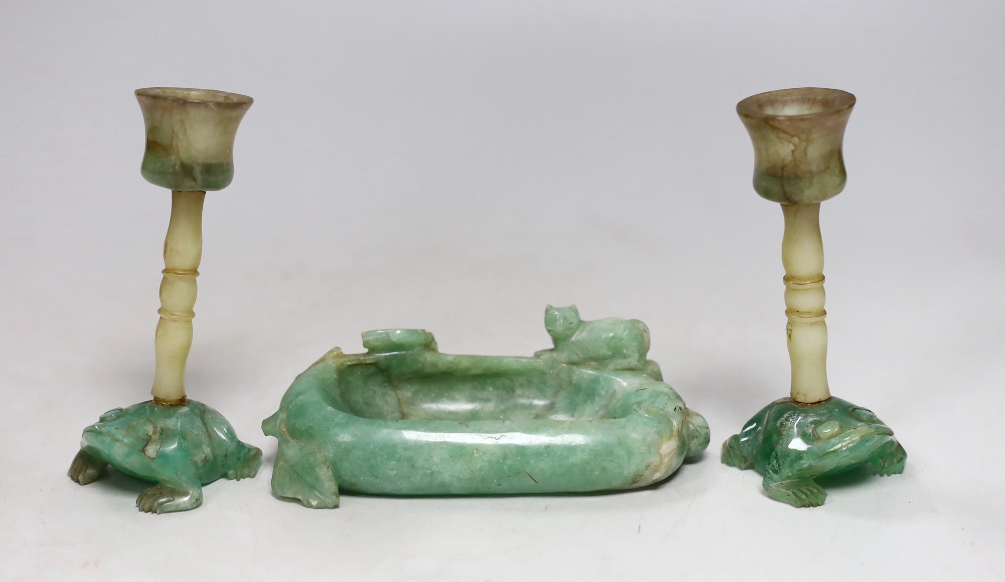 A pair of Chinese jade stemmed and green quartz candlesticks and a green quartz brushwasher, 12cms wide (3)                                                                                                                 