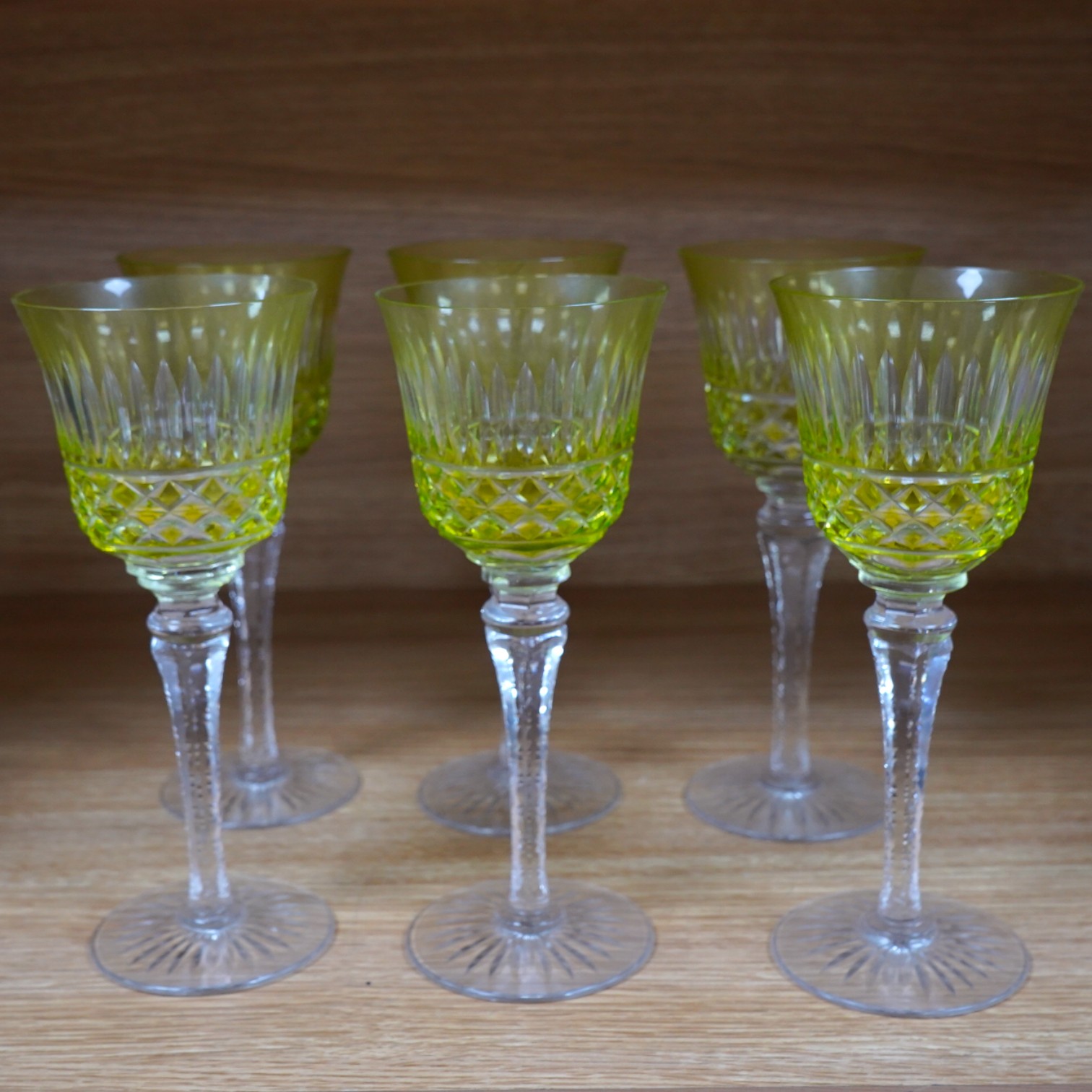 A set of six green cut glass hocks, 20.5cm high. Condition - good                                                                                                                                                           