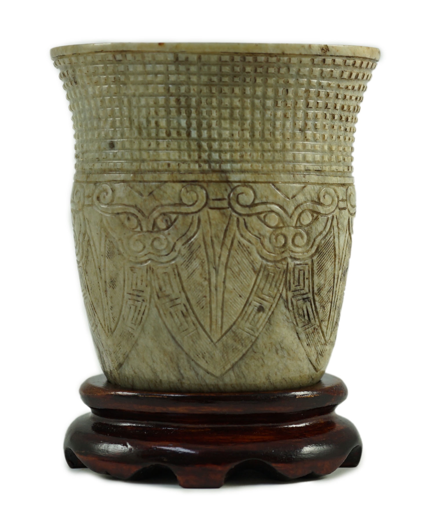 A Chinese archaistic burnt ‘chicken bone’ jade oval cup, chan, probably Song dynasty, 7.1 cm high, small chip repair                                                                                                        