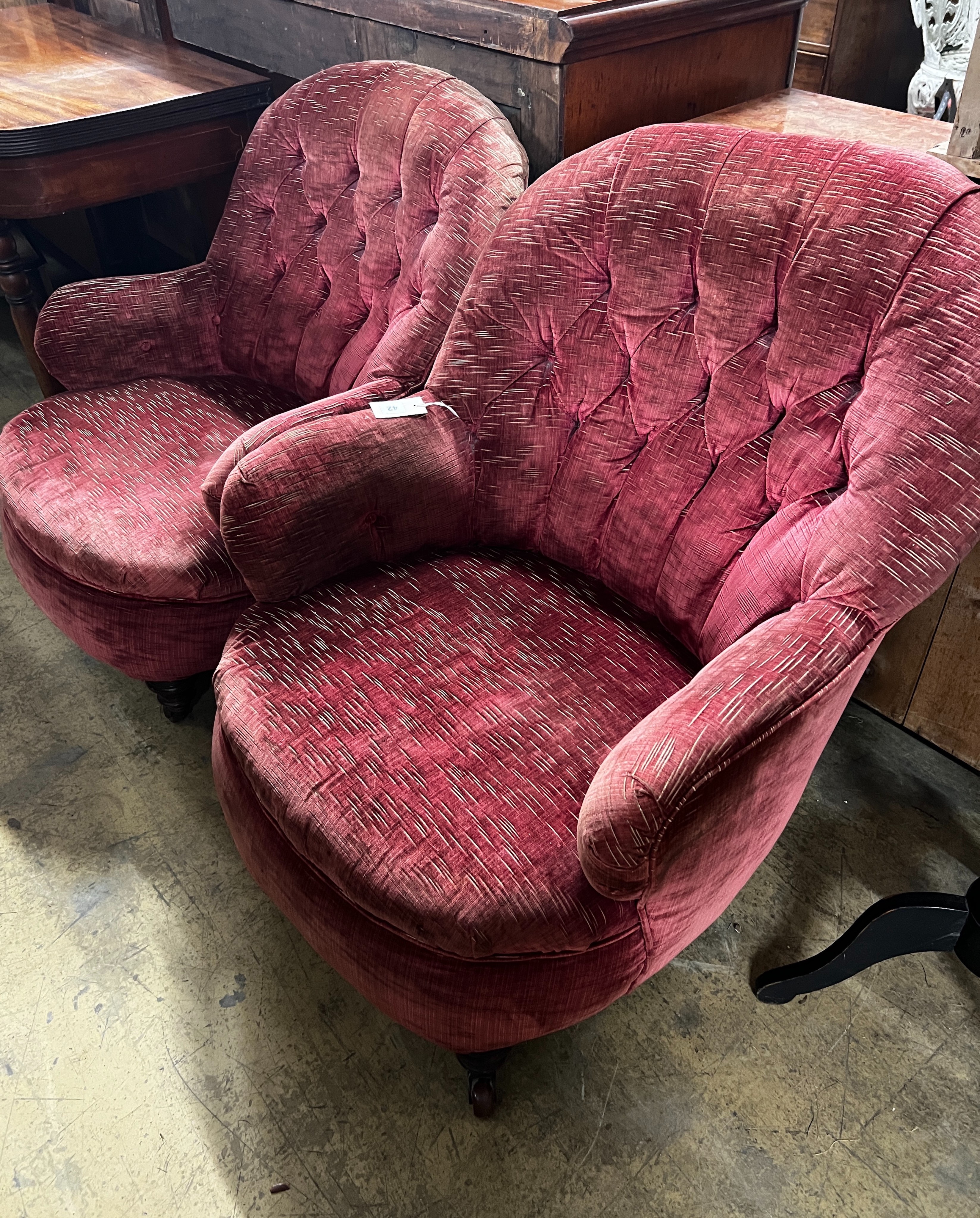 A near pair of Victorian button spoonback armchairs, width 72cm, depth 80cm, height 85cm                                                                                                                                    