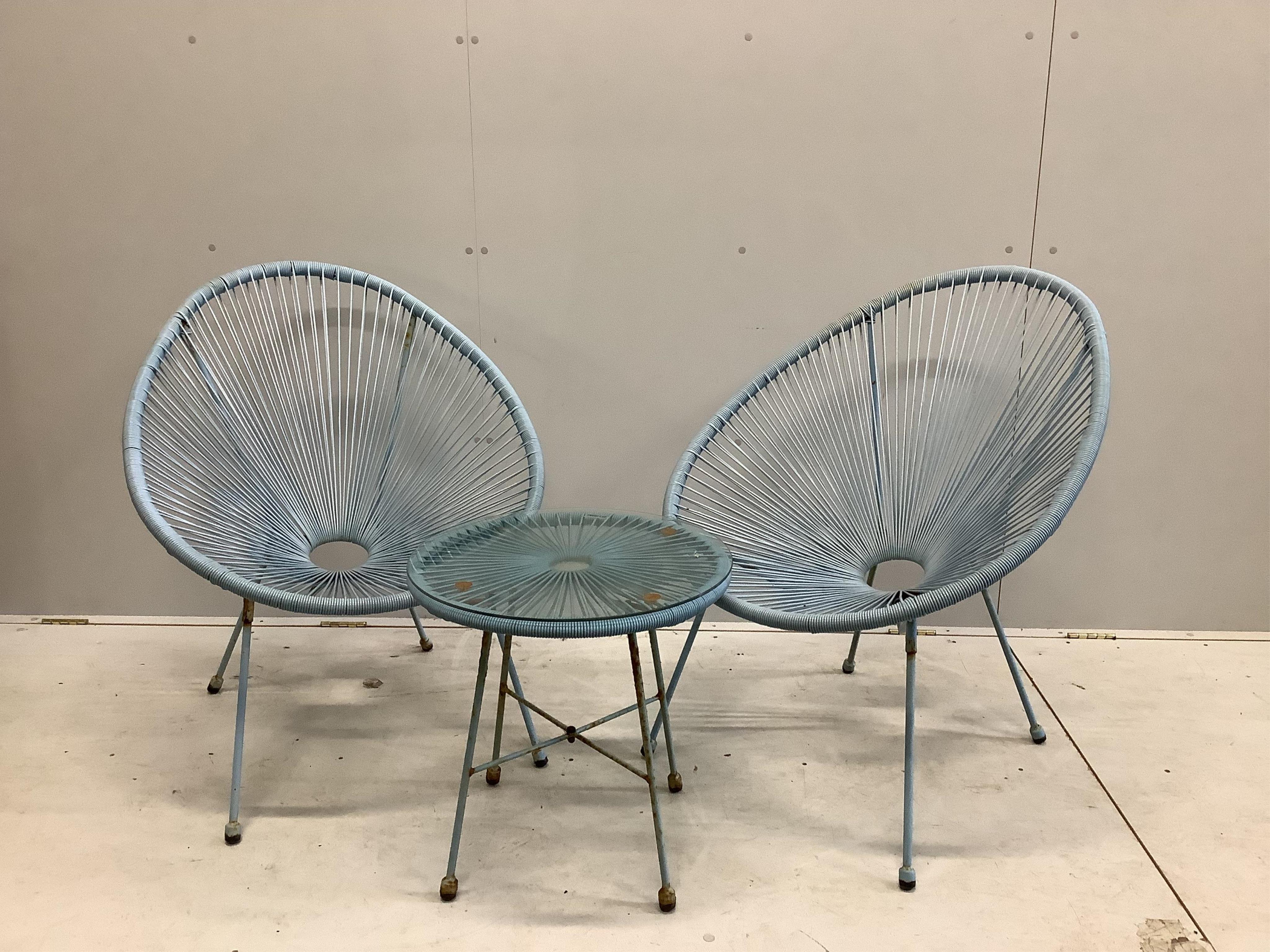 A pair of string garden egg chairs, width 72cm, height 88cm together with a table. Condition - fair                                                                                                                         