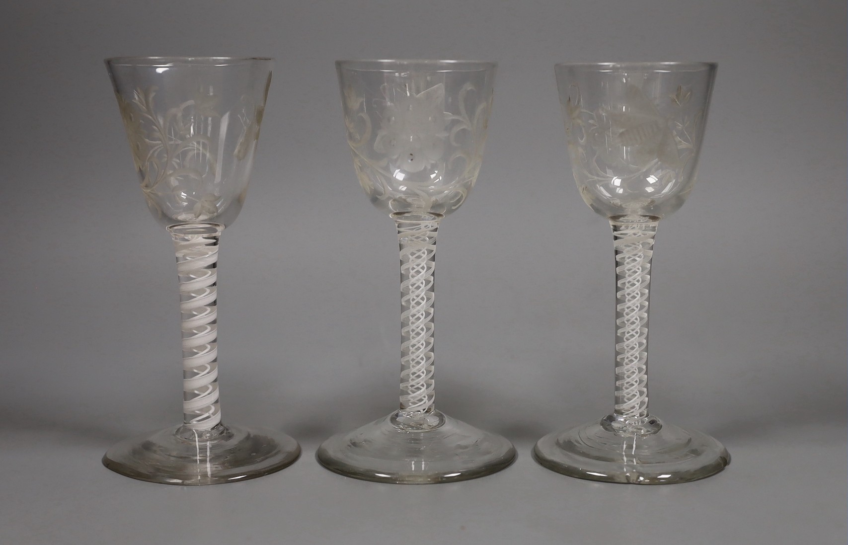 Three 18th century Jacobite type double series opaque twist stem wine glasses, 15cm tall                                                                                                                                    