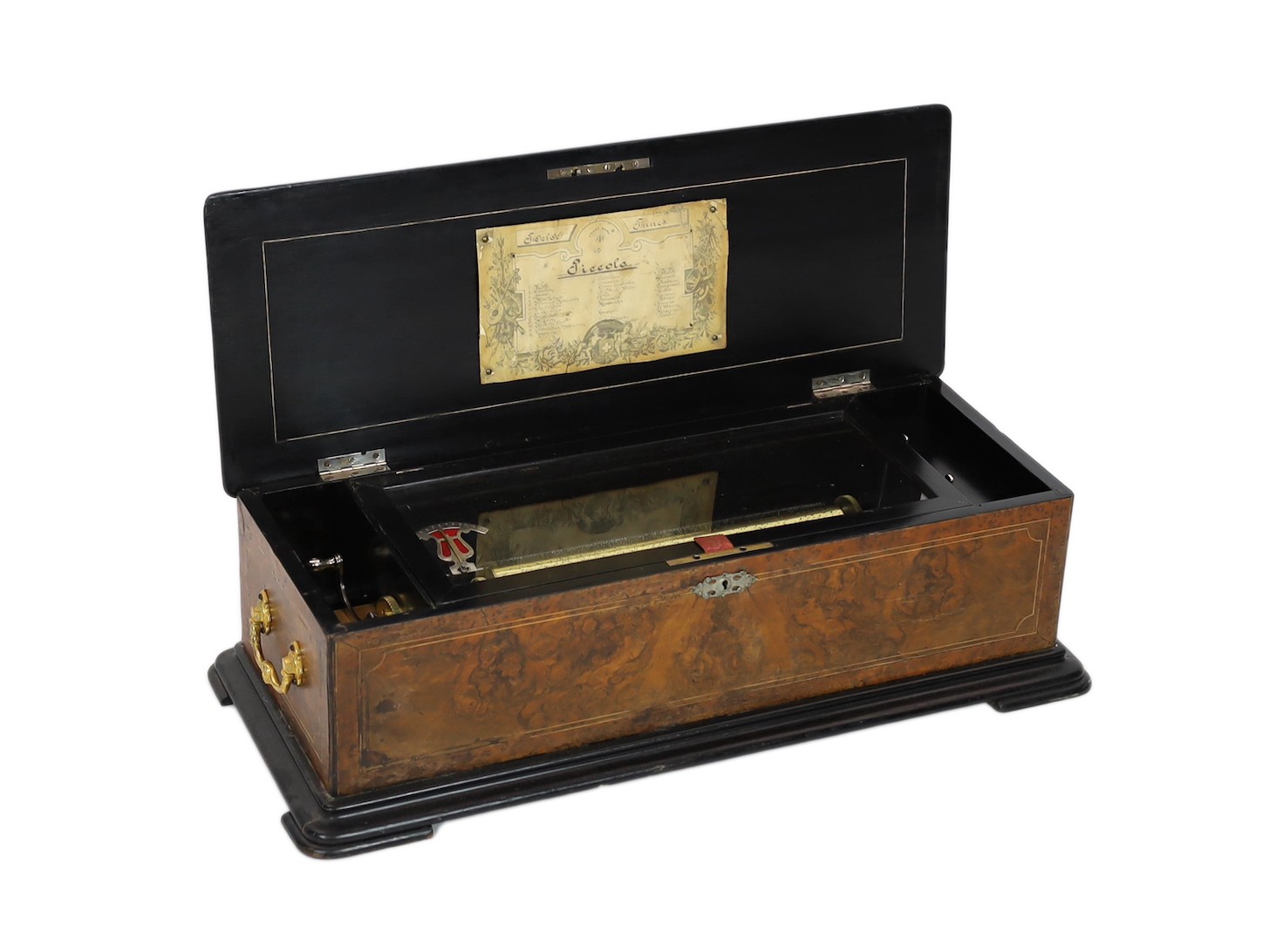 A 19th century Swiss inlaid burr walnut musical box, 73cm wide, 31cm deep, 21cm high                                                                                                                                        