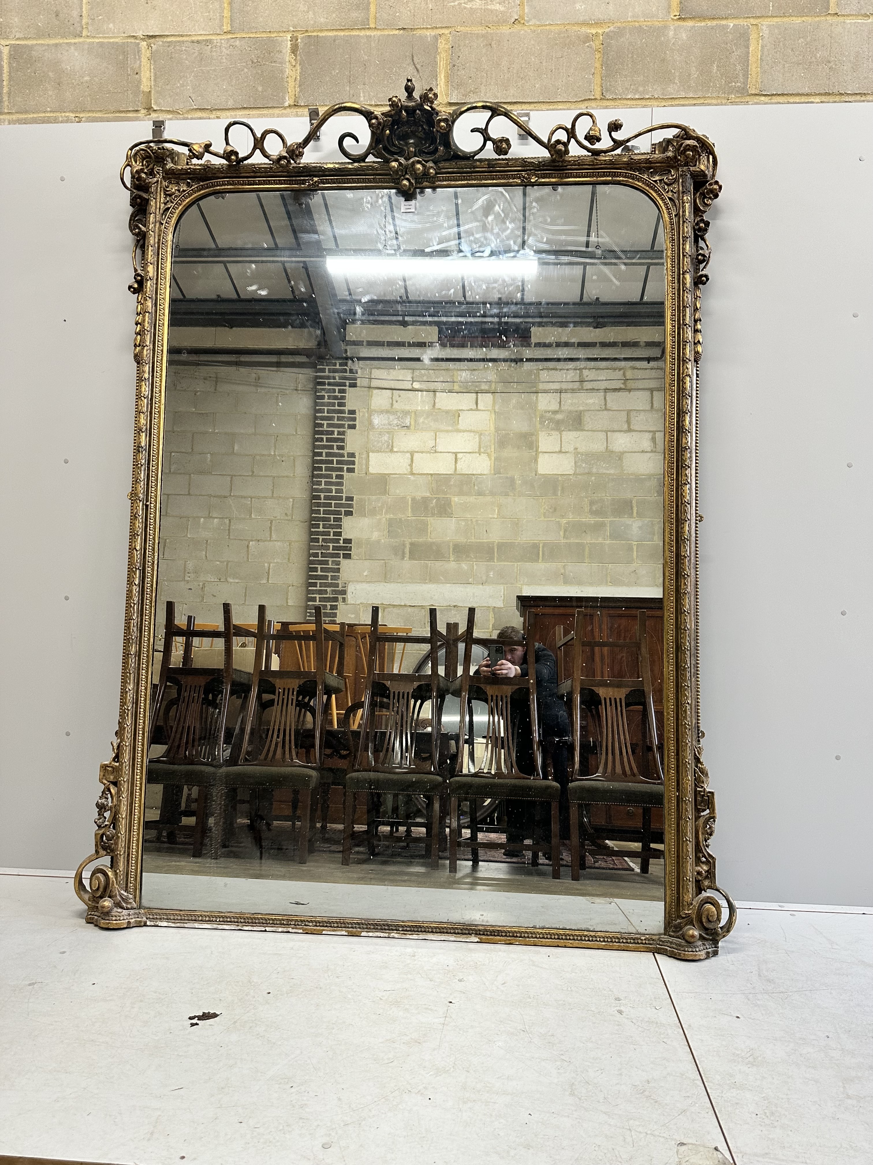 A large Victorian giltwood and composition wall mirror, width 180cm, height 238cm                                                                                                                                           