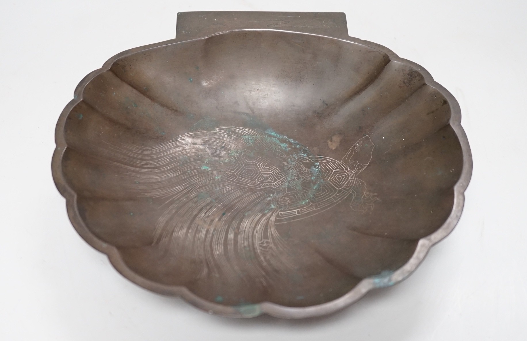 A Japanese silver wire inlaid bronze shell shaped dish, Meiji period. Signed to reverse, 22cm                                                                                                                               