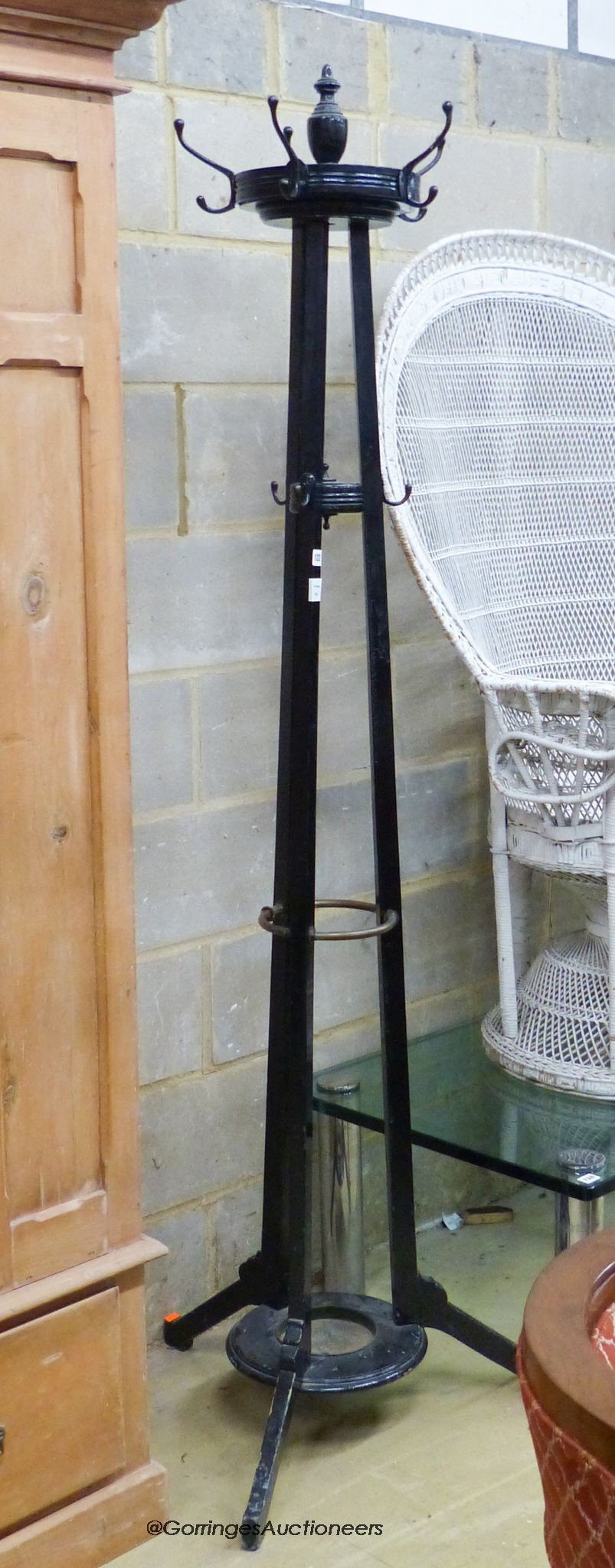 A late Victorian Godwin style black painted coat and stick stand, height 200cm                                                                                                                                              