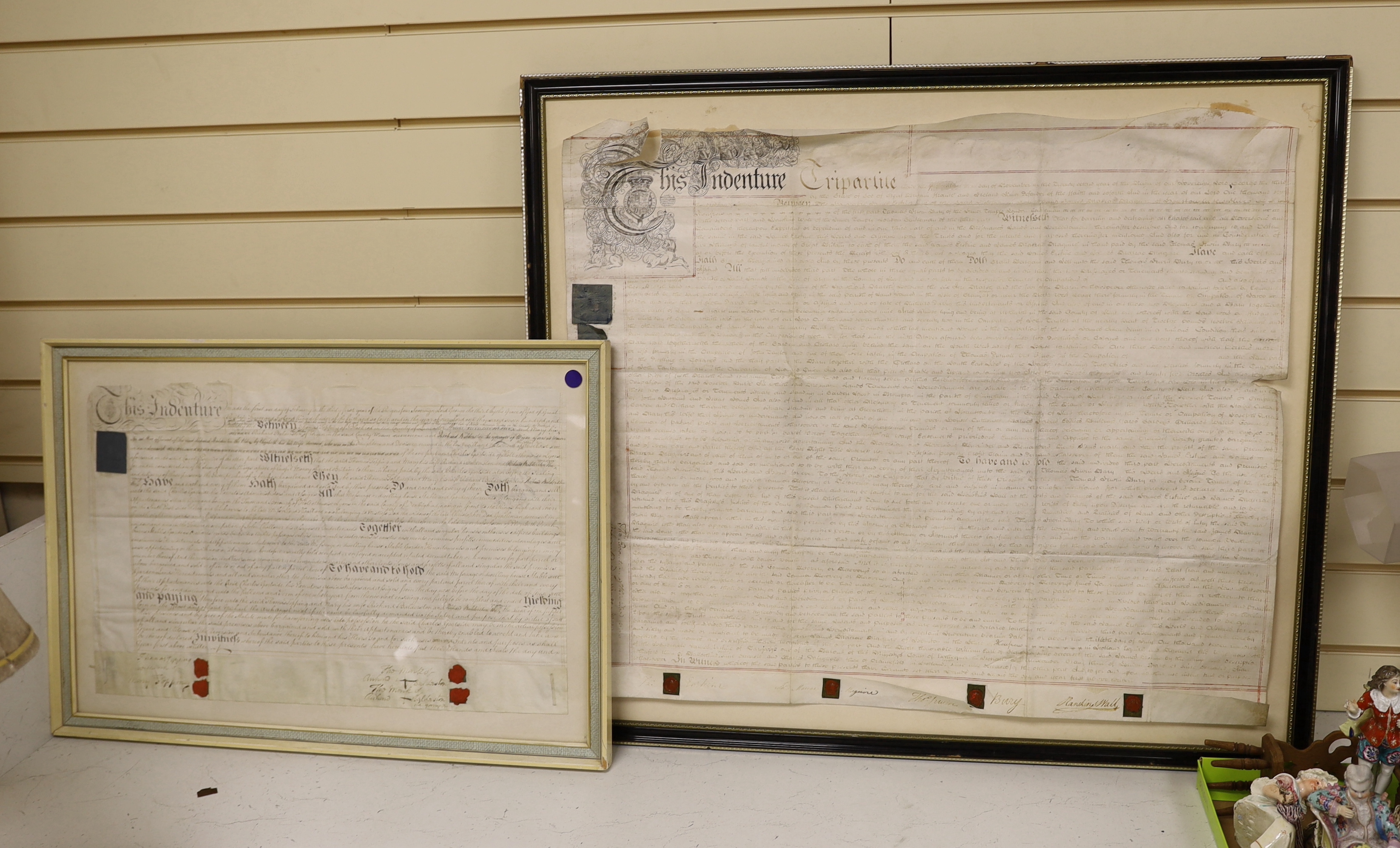 Two framed 18th century indentures, on vellum, largest 75cm wide x 63cm high                                                                                                                                                