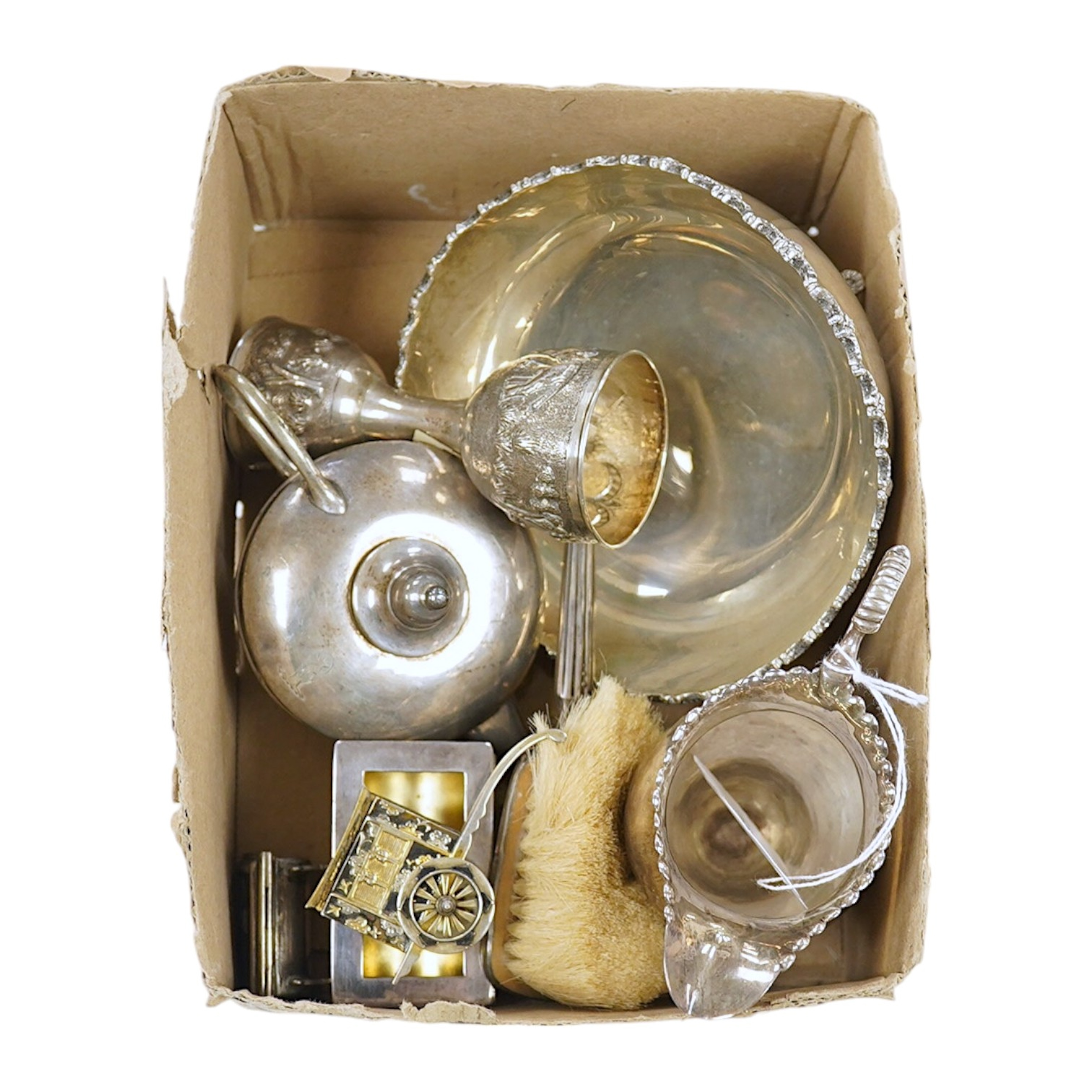 A group of assorted small silver comprising a George III helmet cream jug, a George V oil lamp cigar lighter, two stamp cases (6.5 oz), a white metal bowl stamped silver, an Indian white metal measuring cup, a small brus