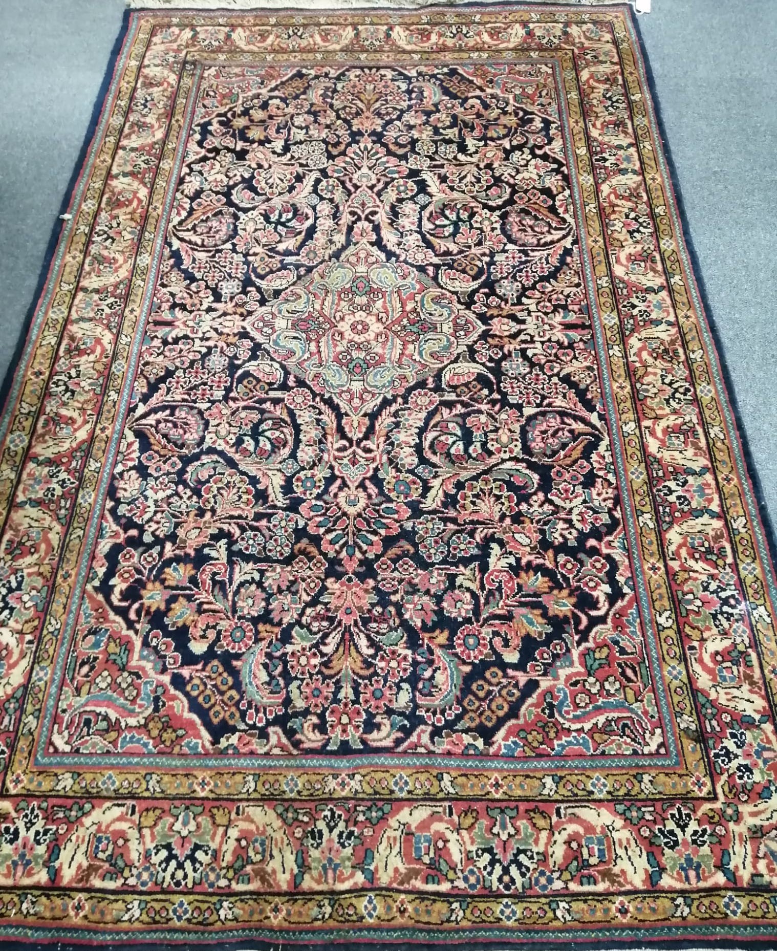 A Persian blue ground rug, probably Mashad, 210 x 131cm                                                                                                                                                                     