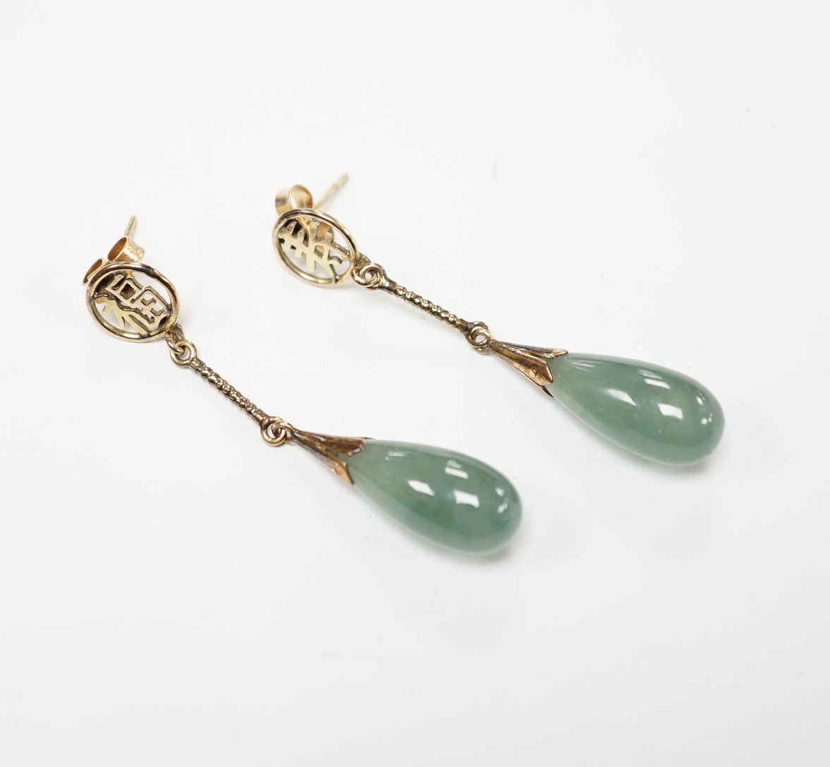 A pair of Chinese yellow metal and jade set drop earrings, 45mm, gross weight 5.7 grams.                                                                                                                                    