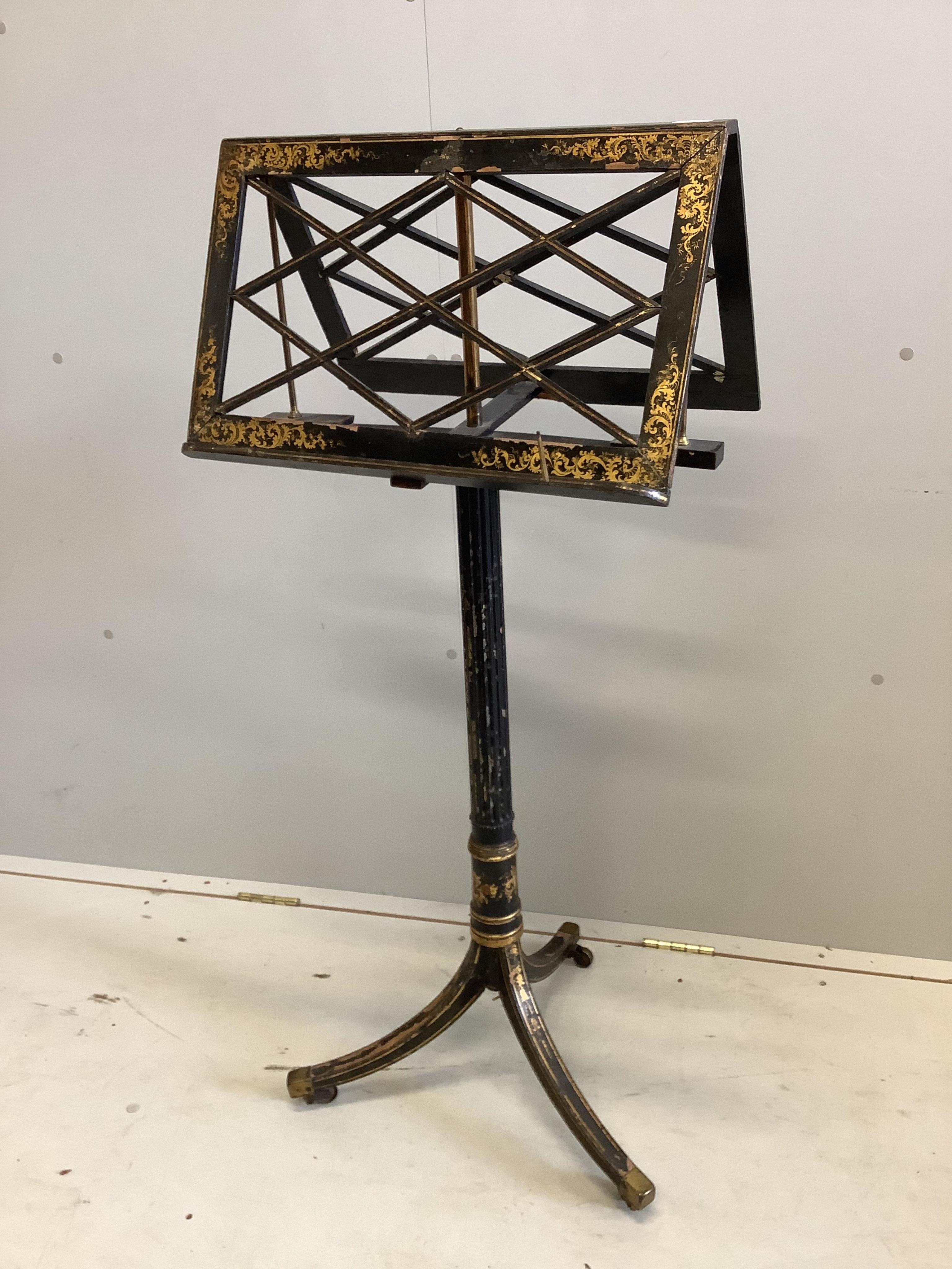 A Regency japanned duet music stand, height 118cm. Condition - poor-fair                                                                                                                                                    