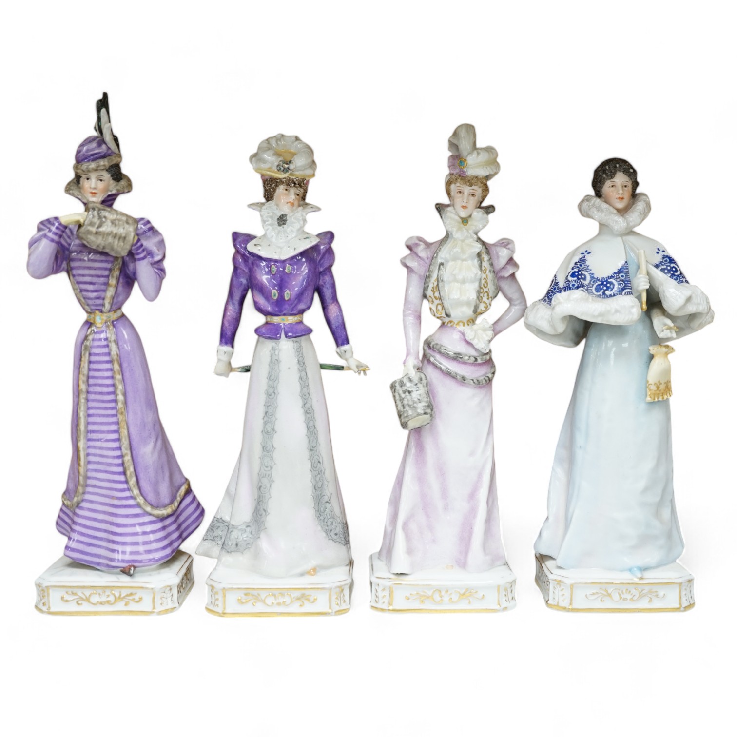 Four German Plaue porcelain figures of Edwardian fashionable ladies, tallest 27.5cm high. Condition - poor some chips                                                                                                       