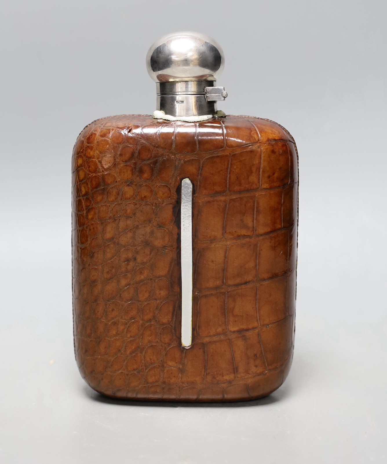James Dixon & Sons silver plate - mounted and crocodile skin hip flask (a.f.)                                                                                                                                               