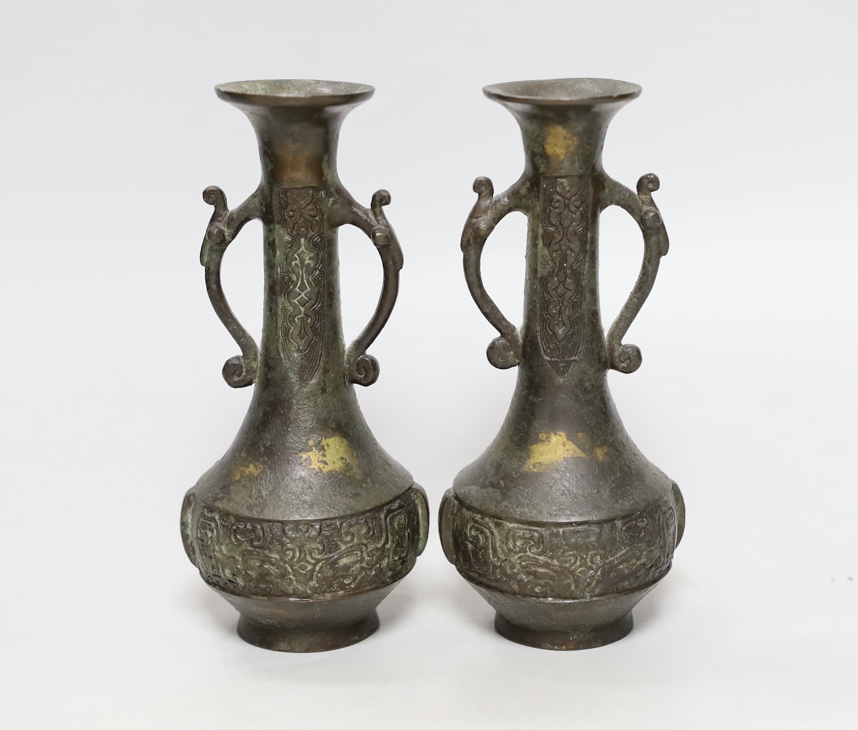 A pair of Chinese two handled bronze bottle vases, late Ming dynasty, 17cm                                                                                                                                                  