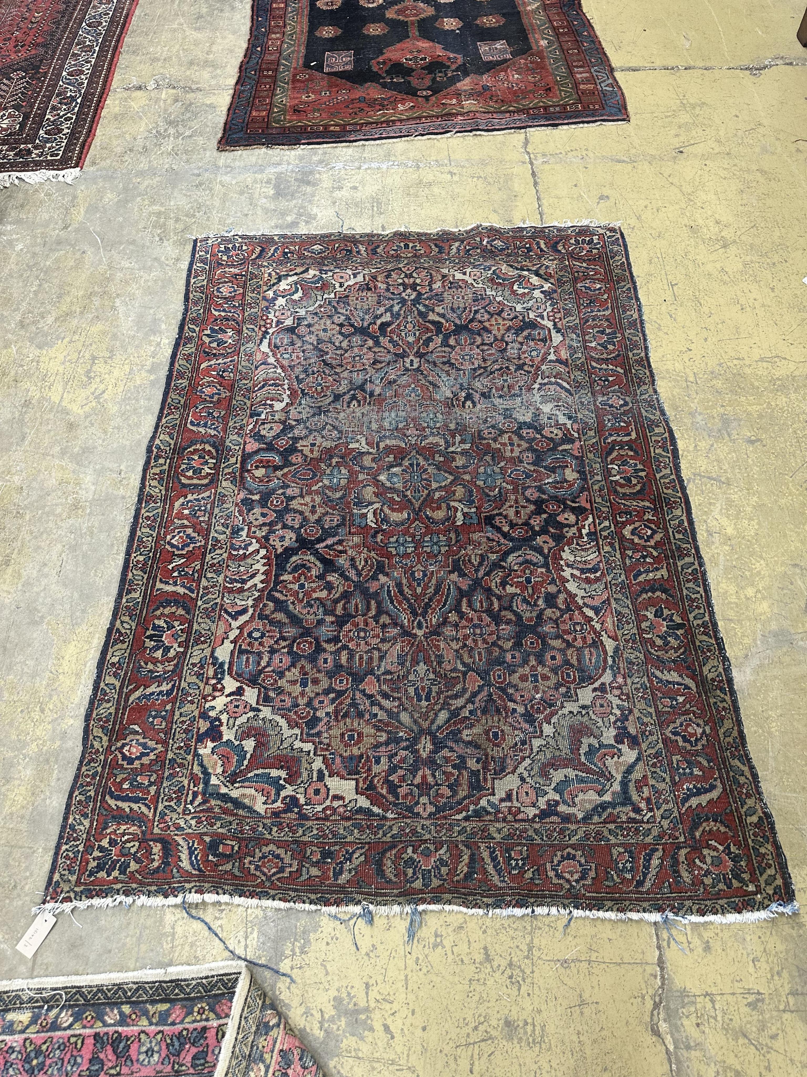 An antique North West Persian rug, 200 x 130cm. Condition - poor                                                                                                                                                            