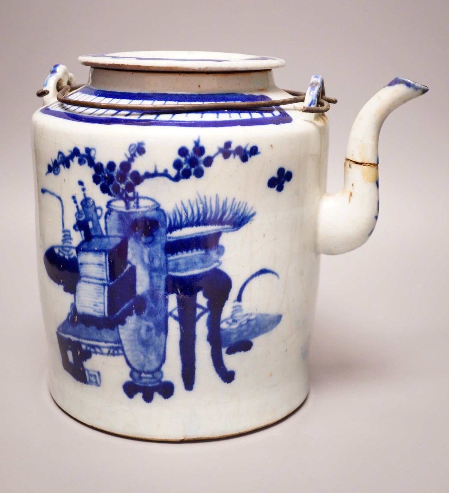 A Chinese provincial blue and white teapot, 23cm                                                                                                                                                                            