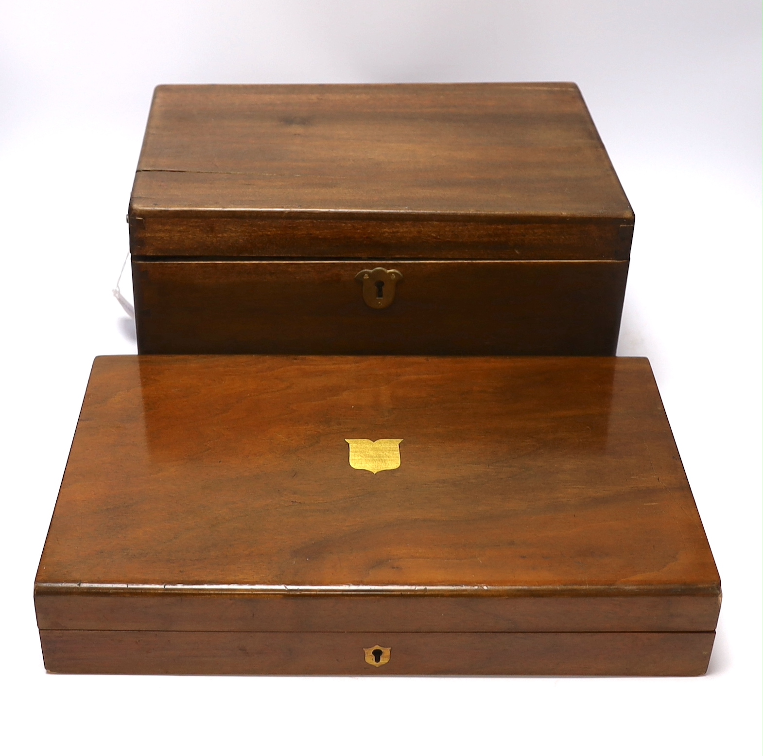 Two mahogany boxes of gun tools, including; bullet moulds, files, a vice, musket balls, etc.                                                                                                                                