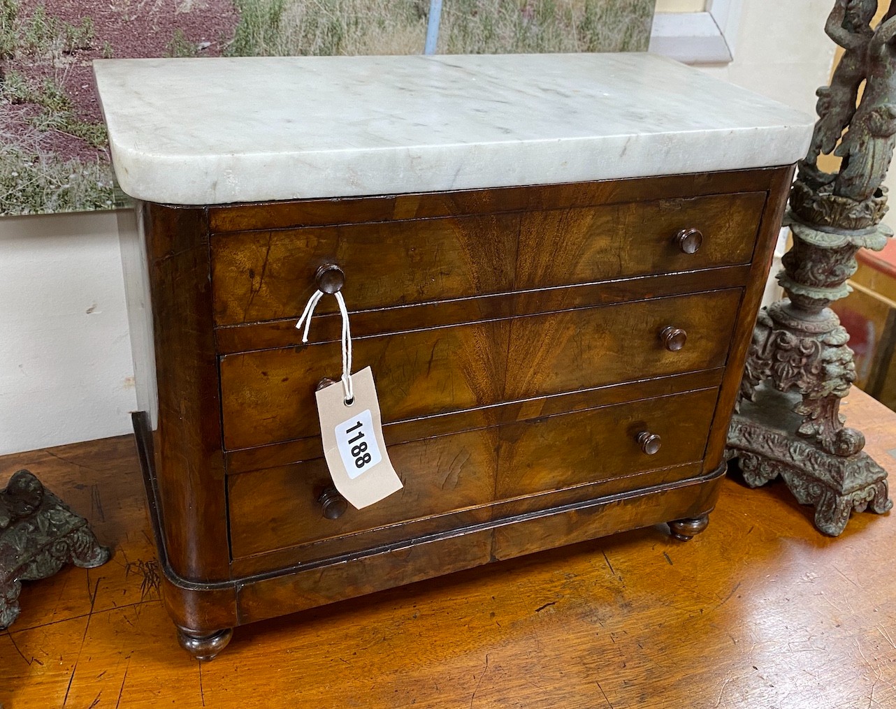 A French marble top Louis Philippe mahogany apprentice commode, width 37cm, depth 18cm, height 30cm                                                                                                                         