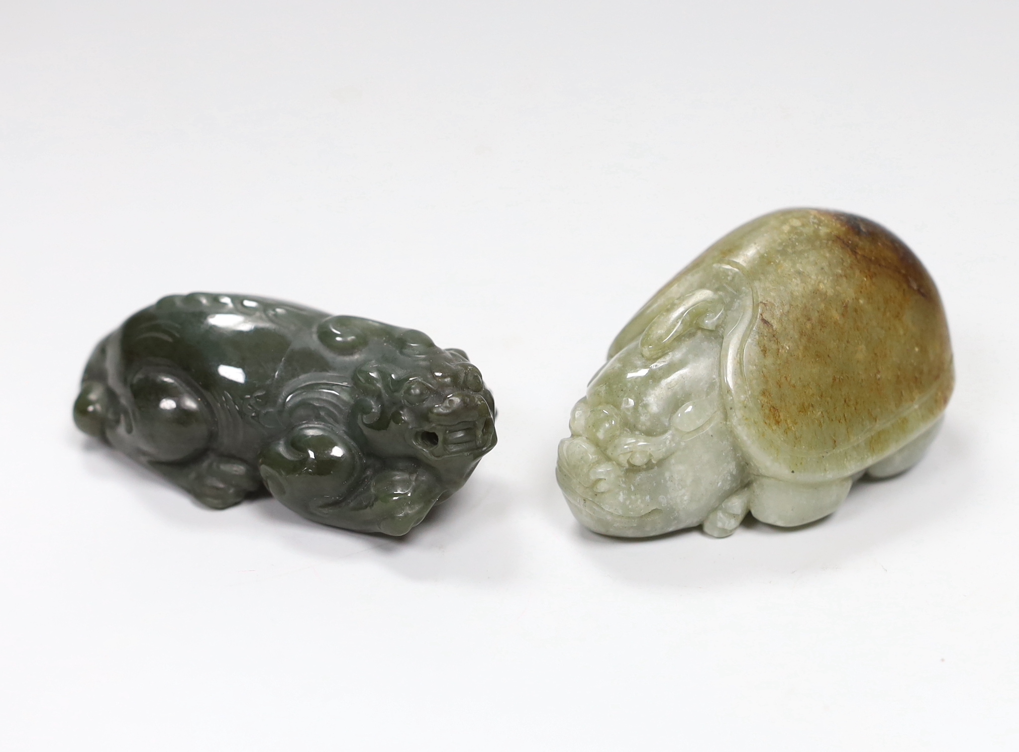 Two Chinese jade figures of a bixi and a horned tortoise, the largest 7.5cm wide                                                                                                                                            