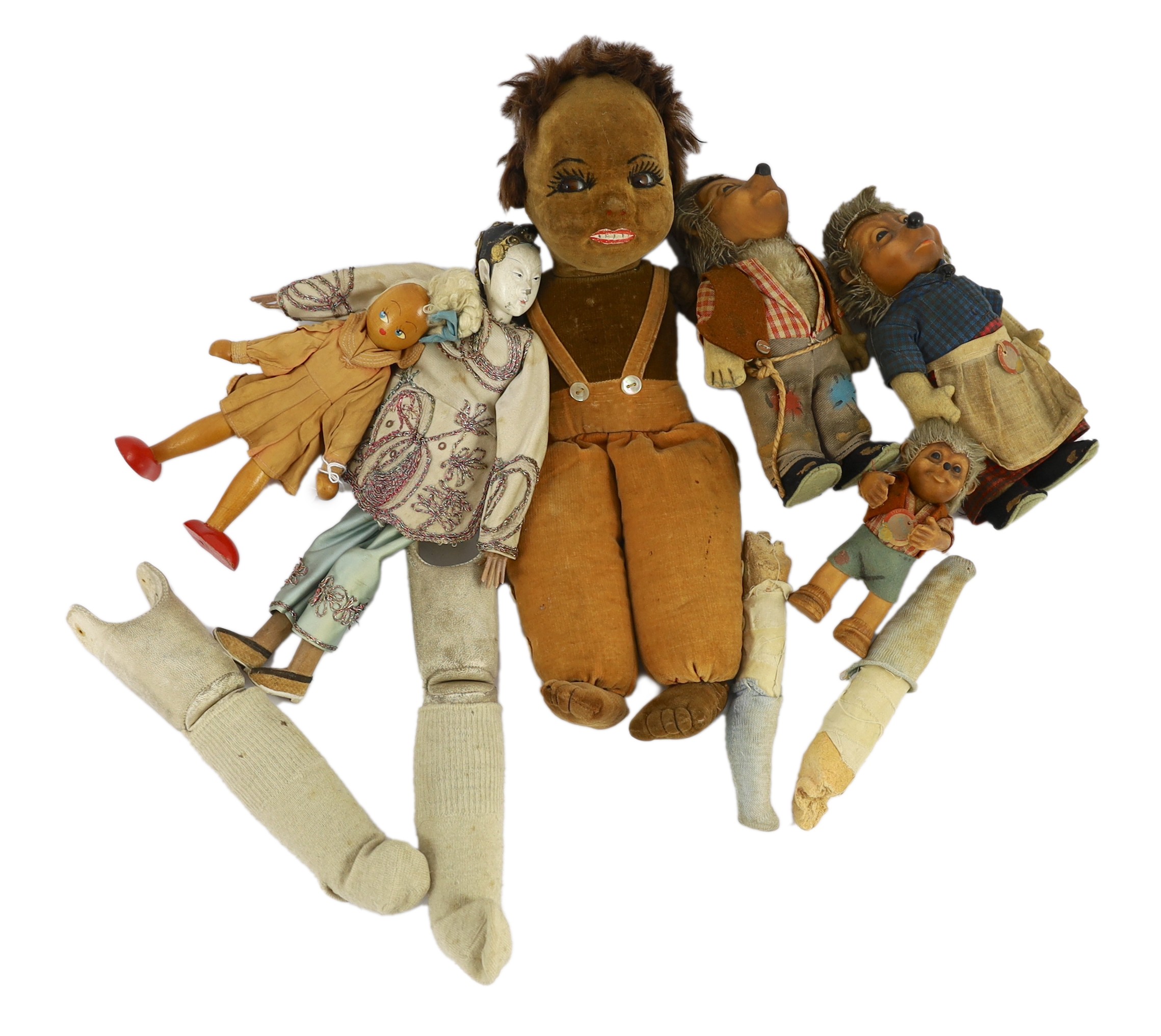 A Norah Wellings-type South Sea Island doll, 13in., three Steiff puppets, Japanese gofun doll, etc.                                                                                                                         
