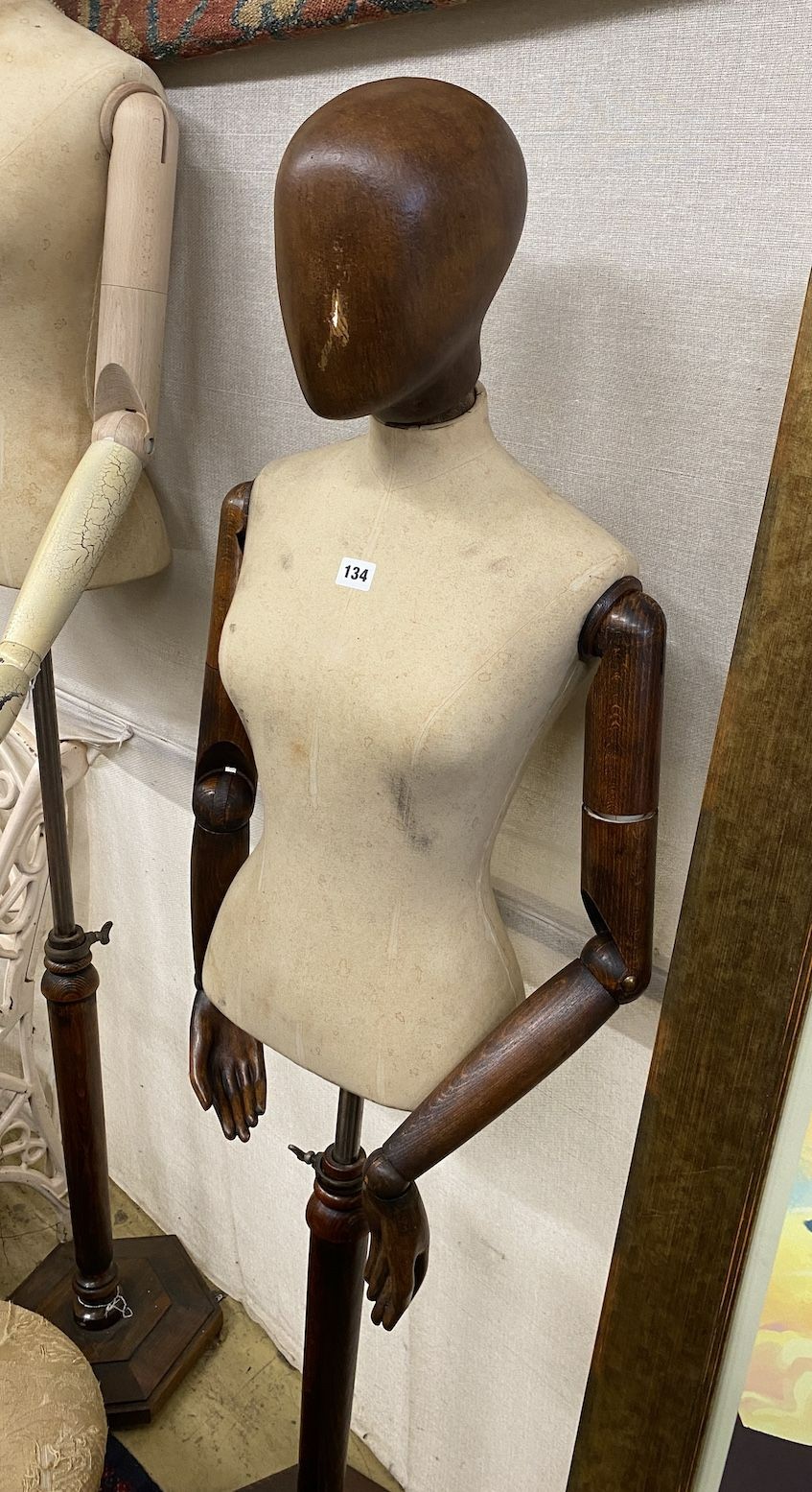 A Victorian style stained beech mannequin on telescopic stand                                                                                                                                                               