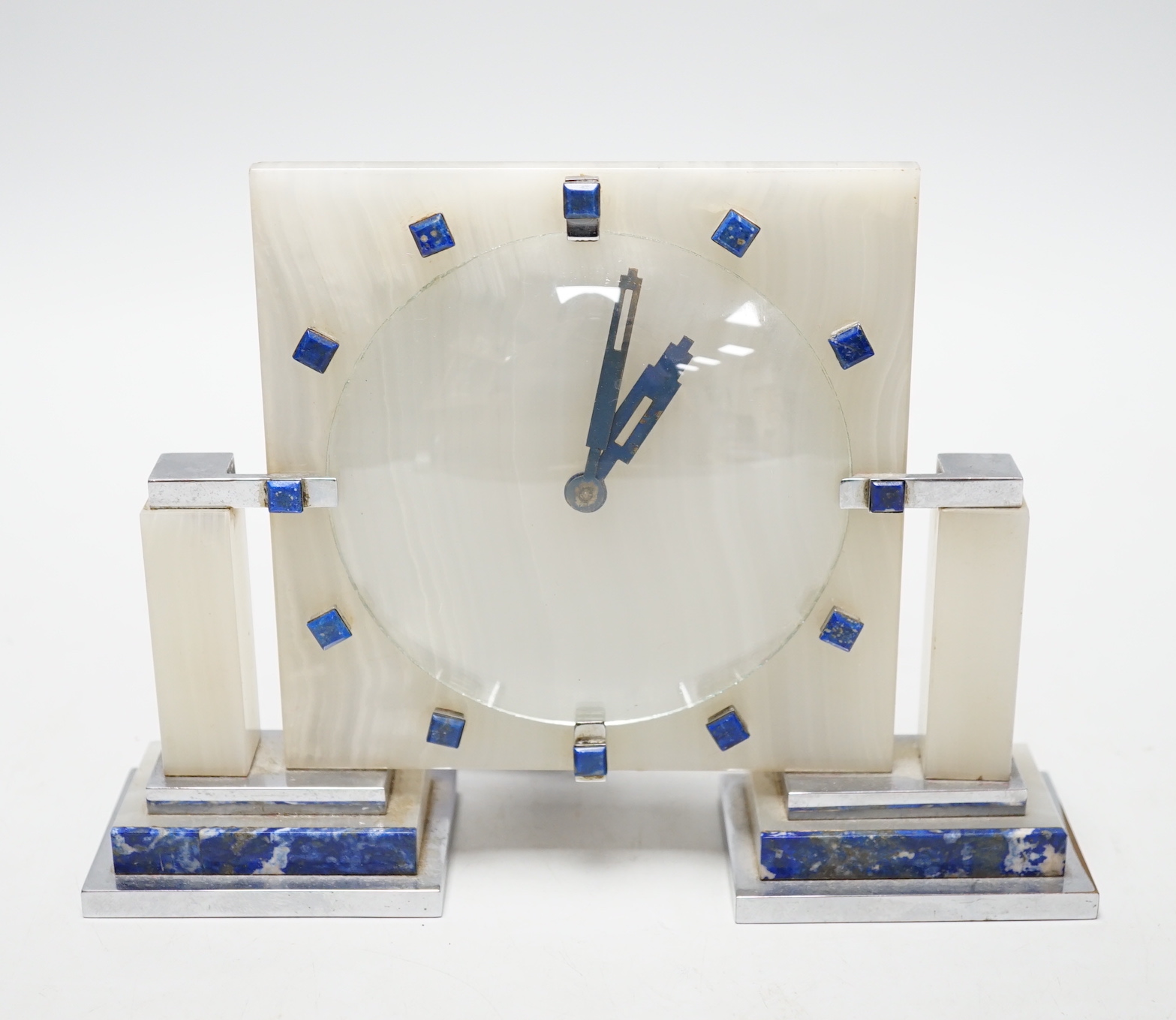 An Art Deco Smiths onyx and lapis lazuli mantel clock, 21.5cm wide                                                                                                                                                          