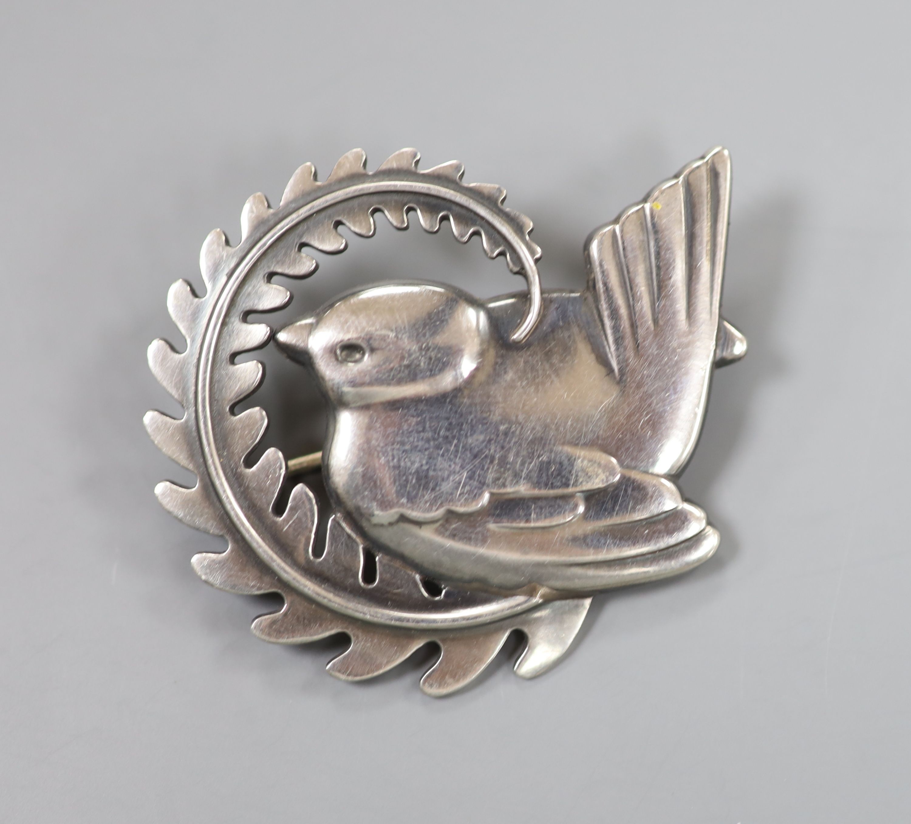 A Georg Jensen sterling robin and frond brooch, no. 309, 46mm.                                                                                                                                                              