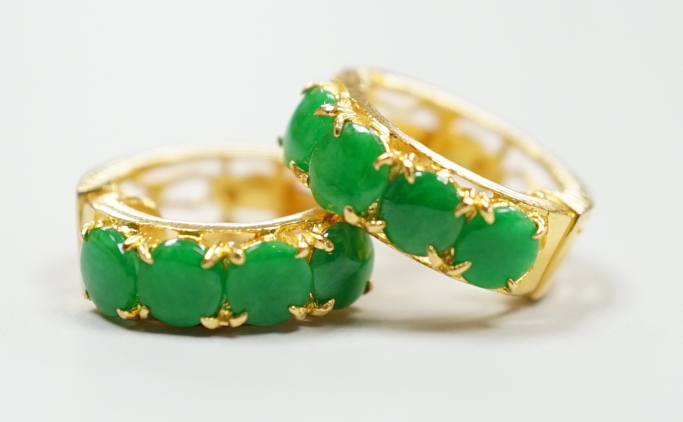 A modern pair of yellow metal, stamped 850, and four stone cabochon jade set hoop earrings, 14mm, gross weight 3.6 grams.                                                                                                   