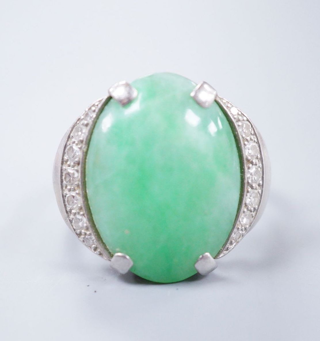 A diamond and jade set white metal dress ring, size K                                                                                                                                                                       