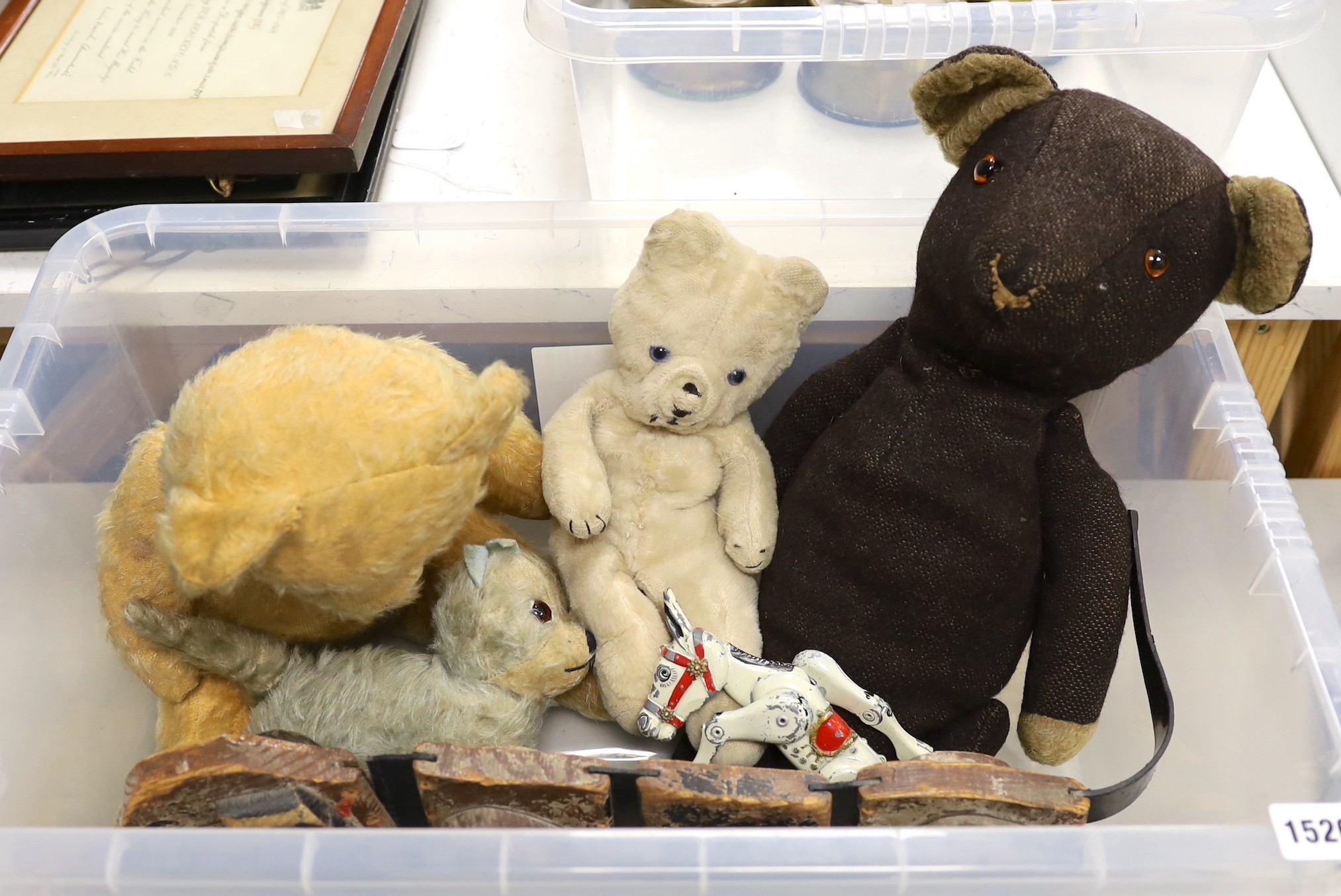 A selection of various early to mid 20th century teddy bears and toys, to include a Tri pulling wooden sausage dog                                                                                                          