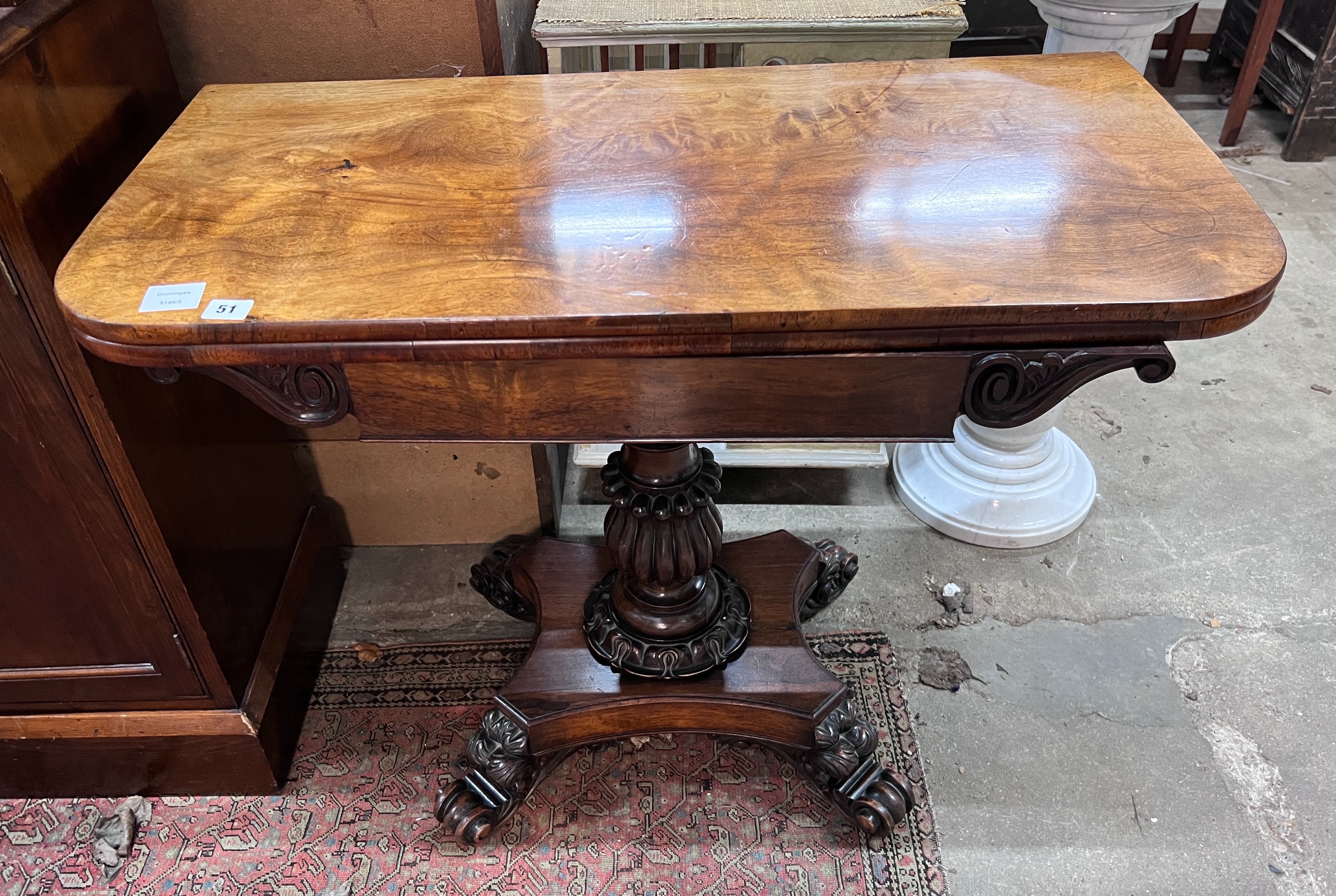 An early Victorian rectangular rosewood folding tea table, width 91cm, depth 45cm, height 72cm *Please note the sale commences at 9am.                                                                                      