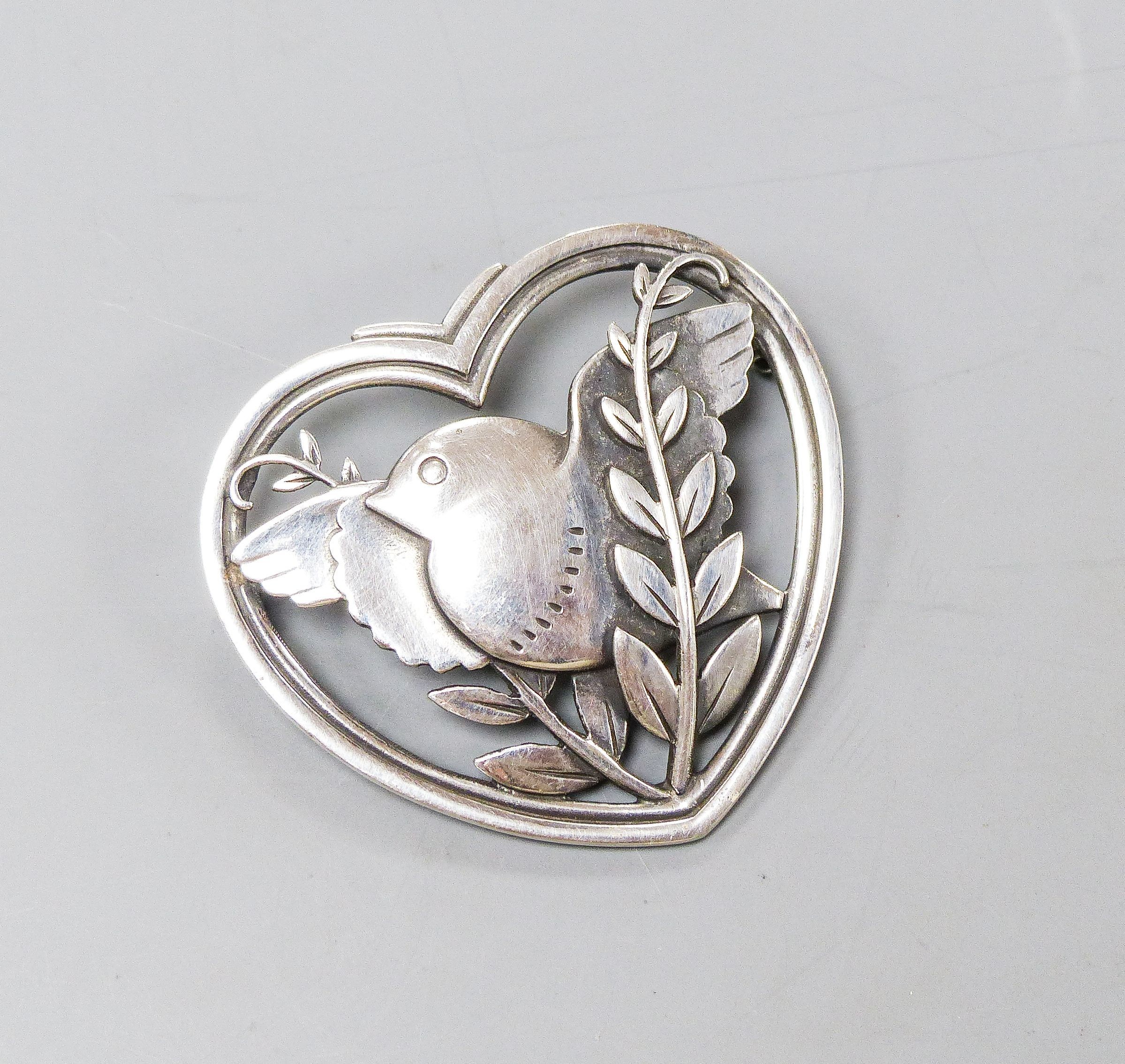 A Georg Jensen sterling robin and frond heart shaped brooch, no. 239, 41mm.                                                                                                                                                 