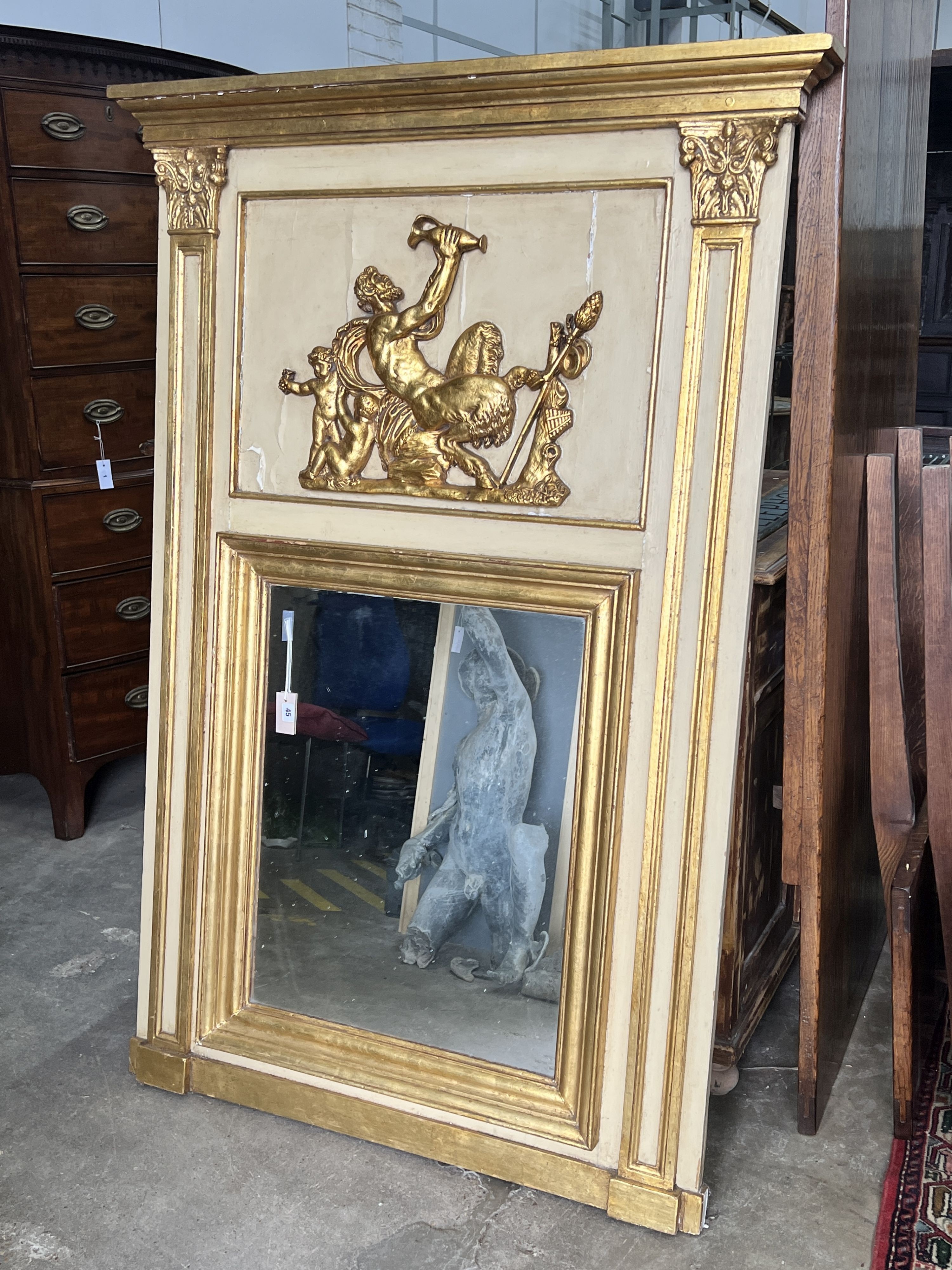 A 19th century Continental painted giltwood and gesso pier glass, width 116cm, height 173cm                                                                                                                                 